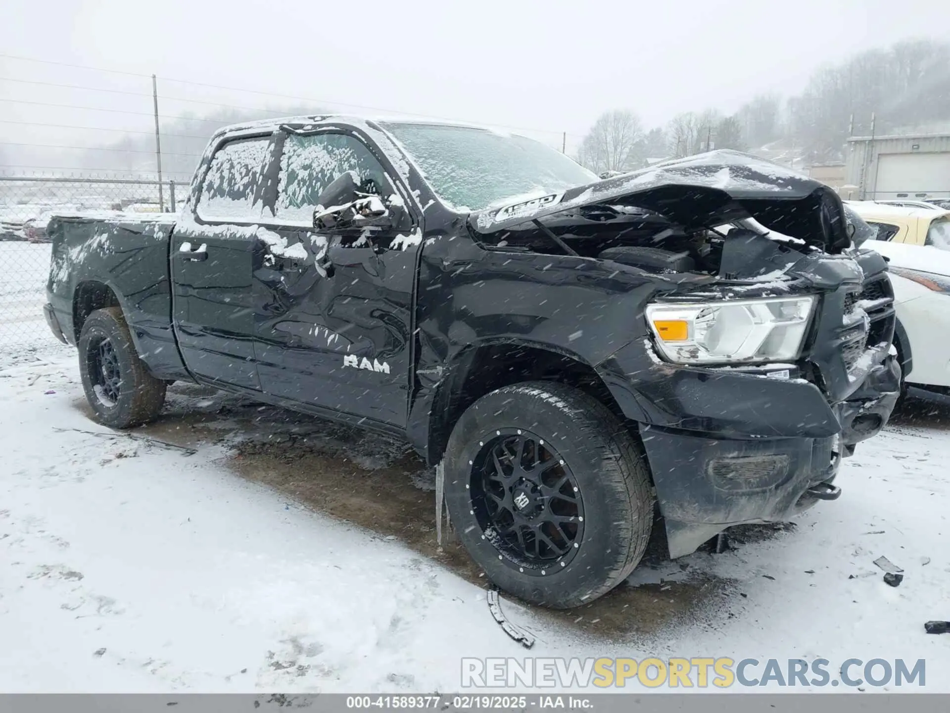 1 Photograph of a damaged car 1C6SRFCT8KN812411 RAM 1500 2019