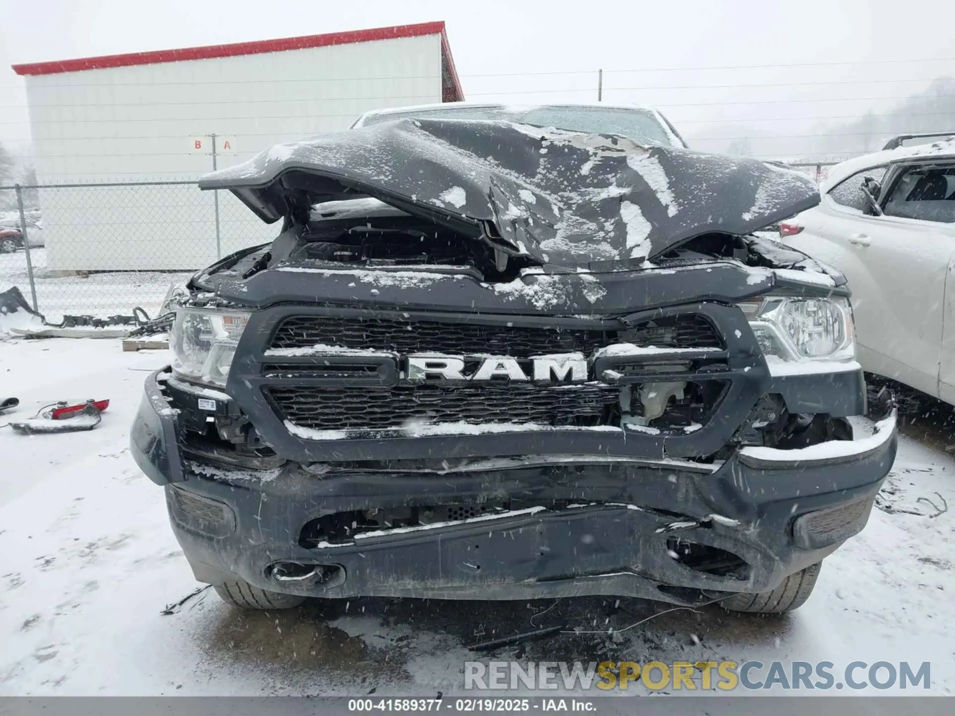 13 Photograph of a damaged car 1C6SRFCT8KN812411 RAM 1500 2019