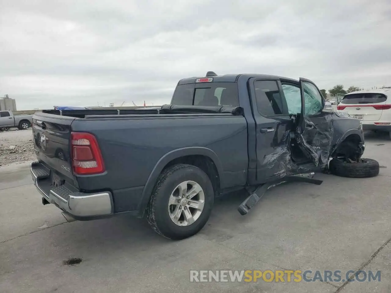 3 Photograph of a damaged car 1C6SRFDT4KN806409 RAM 1500 2019