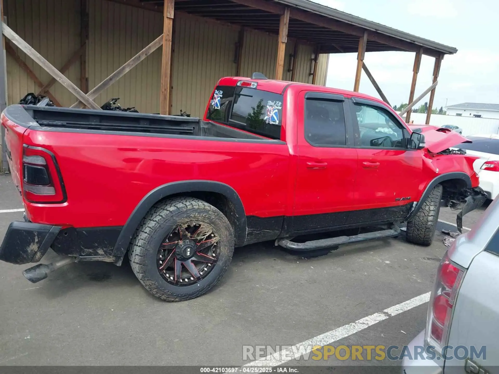 13 Photograph of a damaged car 1C6SRFET2KN599078 RAM 1500 2019