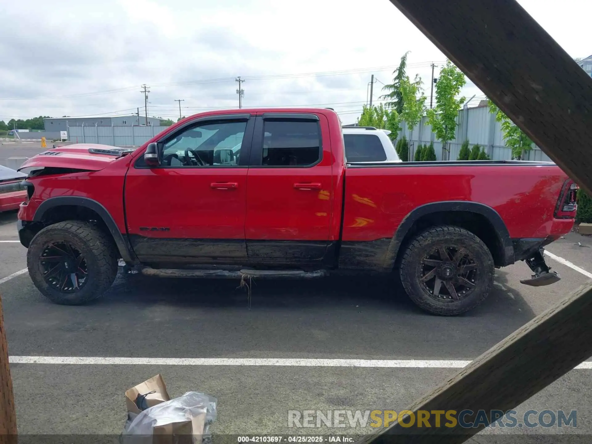 14 Photograph of a damaged car 1C6SRFET2KN599078 RAM 1500 2019