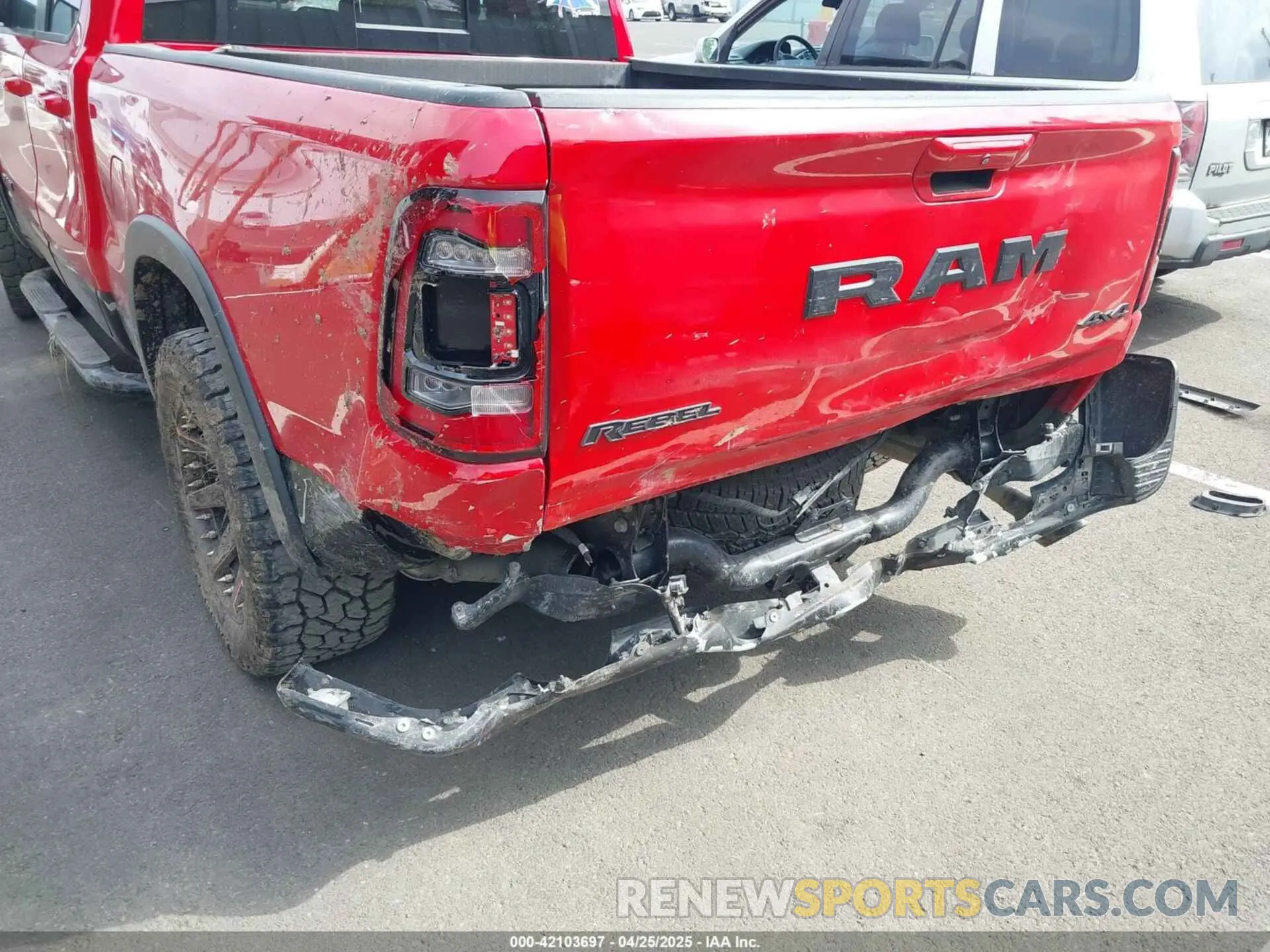 19 Photograph of a damaged car 1C6SRFET2KN599078 RAM 1500 2019