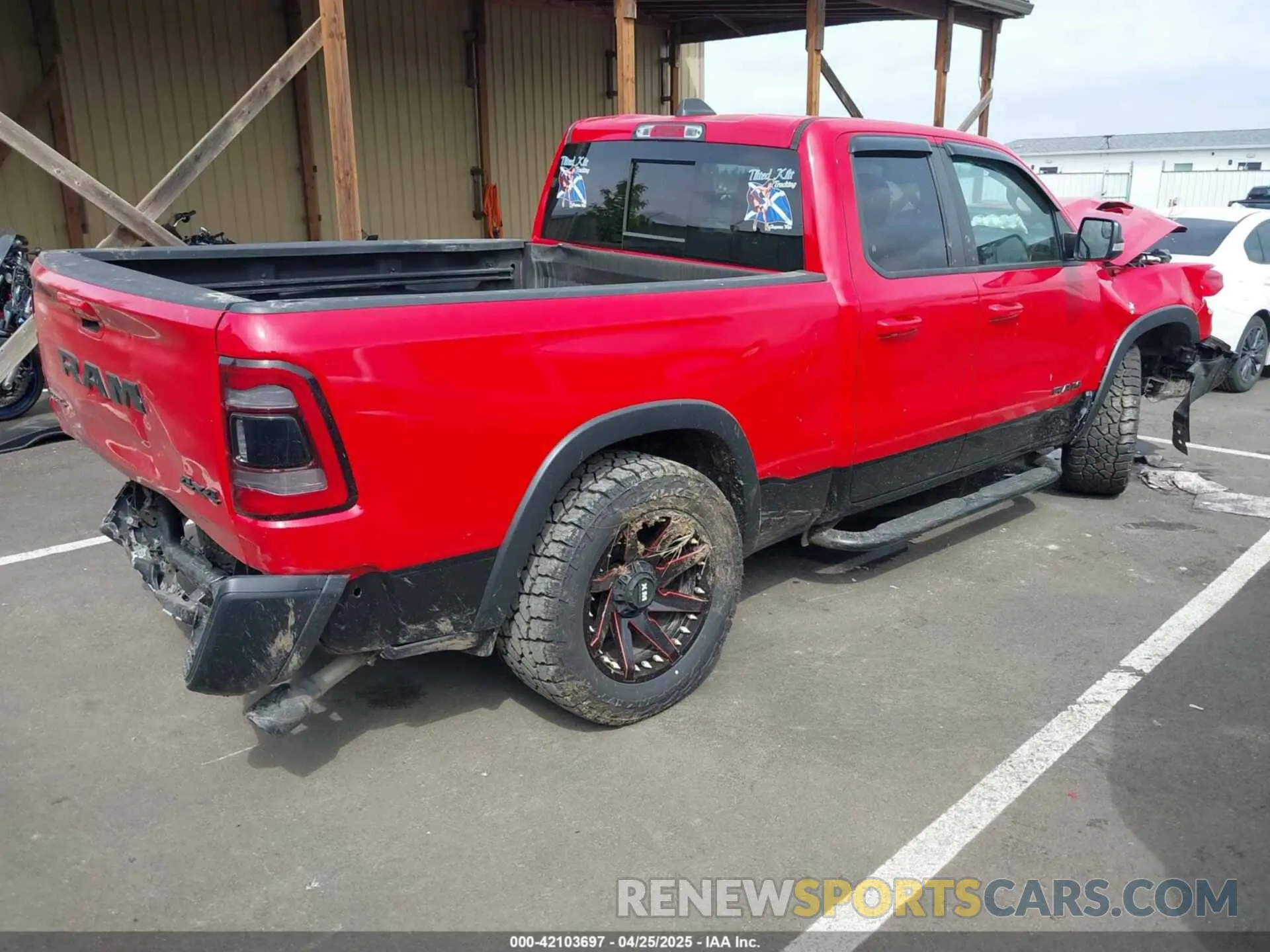 4 Photograph of a damaged car 1C6SRFET2KN599078 RAM 1500 2019