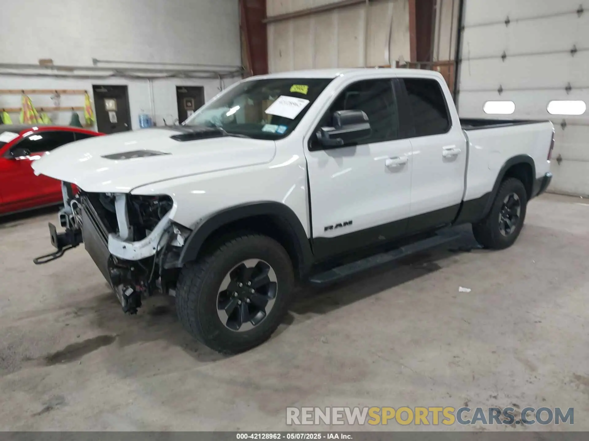 2 Photograph of a damaged car 1C6SRFET6KN865167 RAM 1500 2019