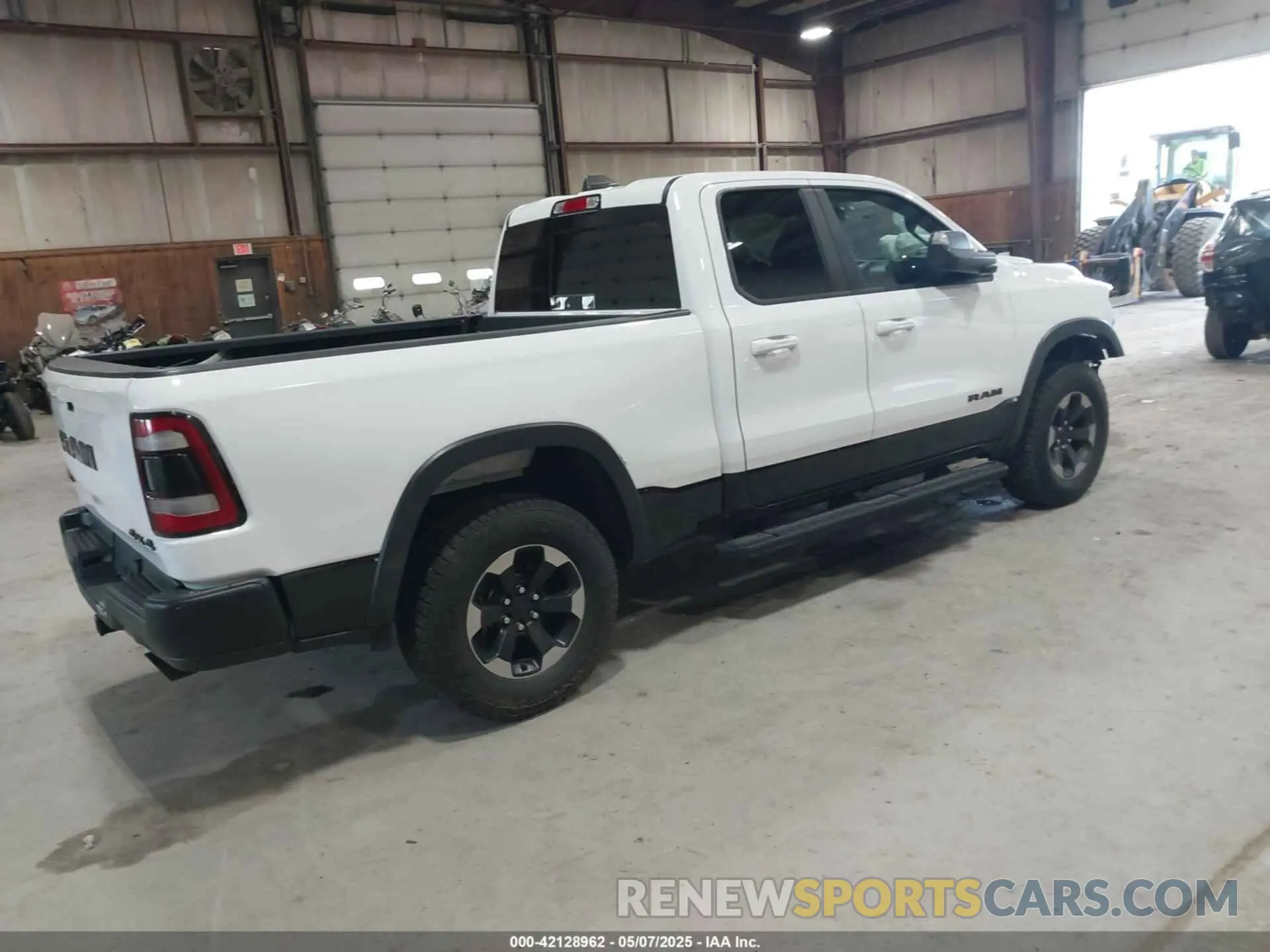 4 Photograph of a damaged car 1C6SRFET6KN865167 RAM 1500 2019