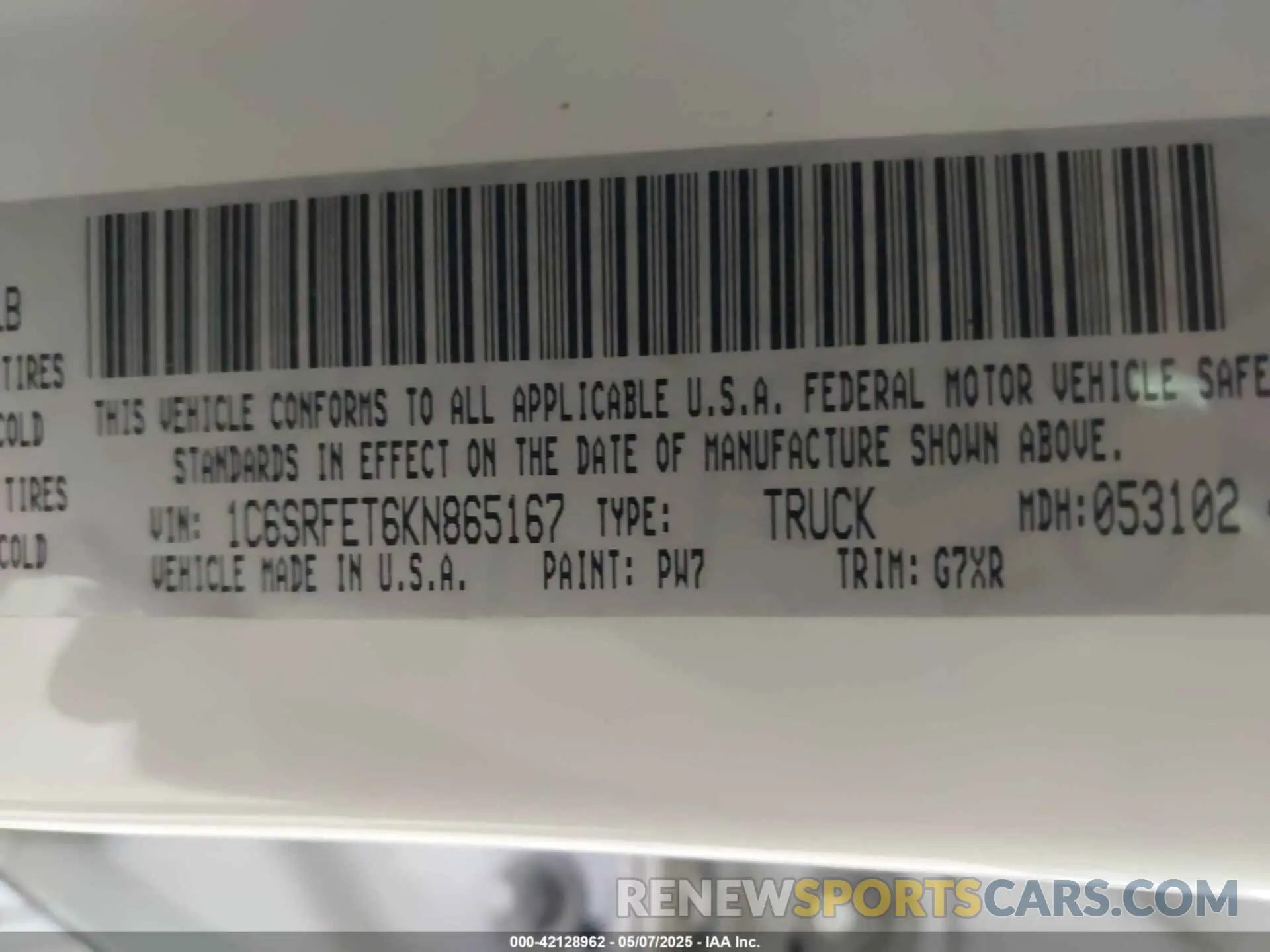 9 Photograph of a damaged car 1C6SRFET6KN865167 RAM 1500 2019