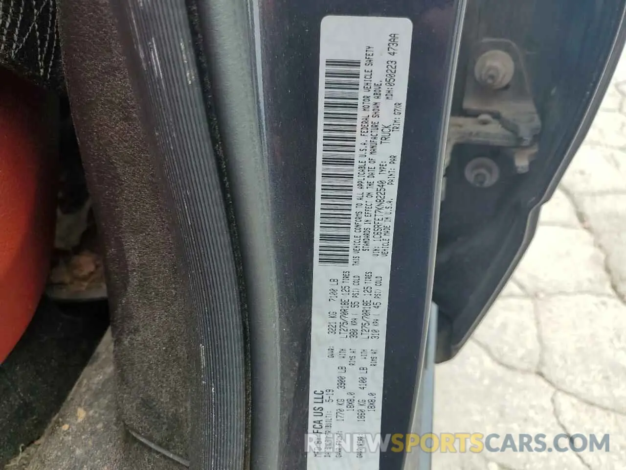 12 Photograph of a damaged car 1C6SRFET7KN822540 RAM 1500 2019