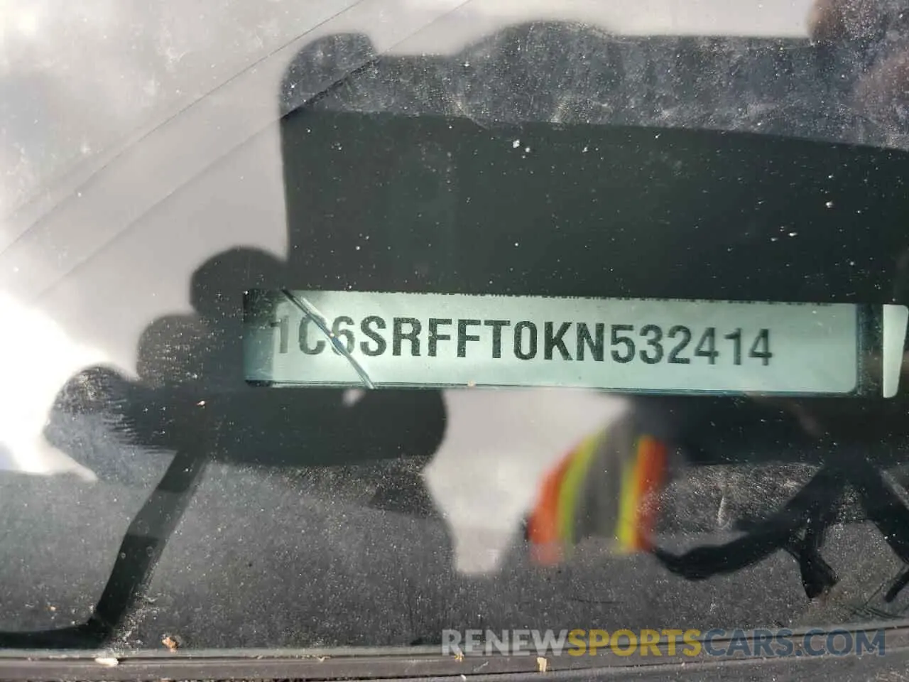 13 Photograph of a damaged car 1C6SRFFT0KN532414 RAM 1500 2019
