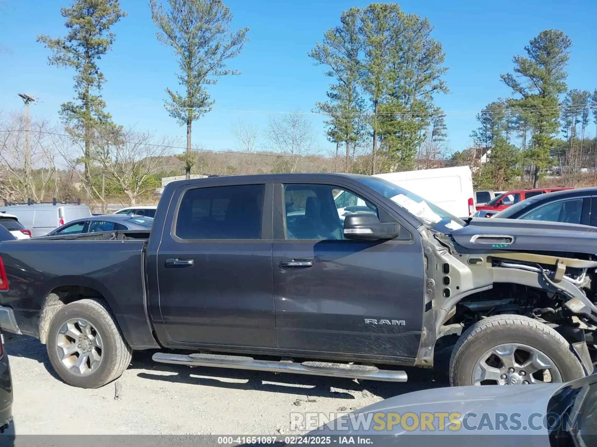 13 Photograph of a damaged car 1C6SRFFT0KN627457 RAM 1500 2019
