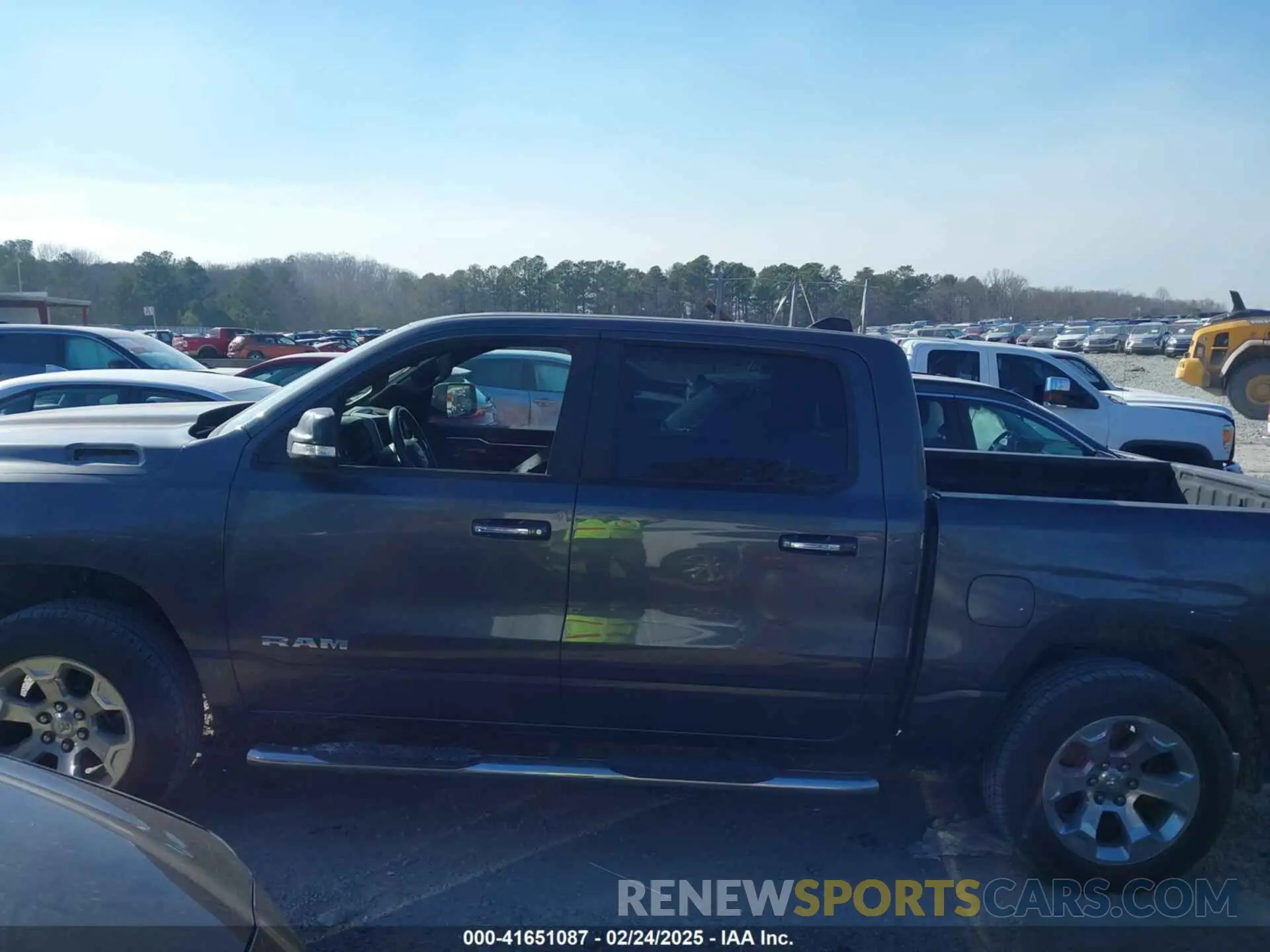 14 Photograph of a damaged car 1C6SRFFT0KN627457 RAM 1500 2019