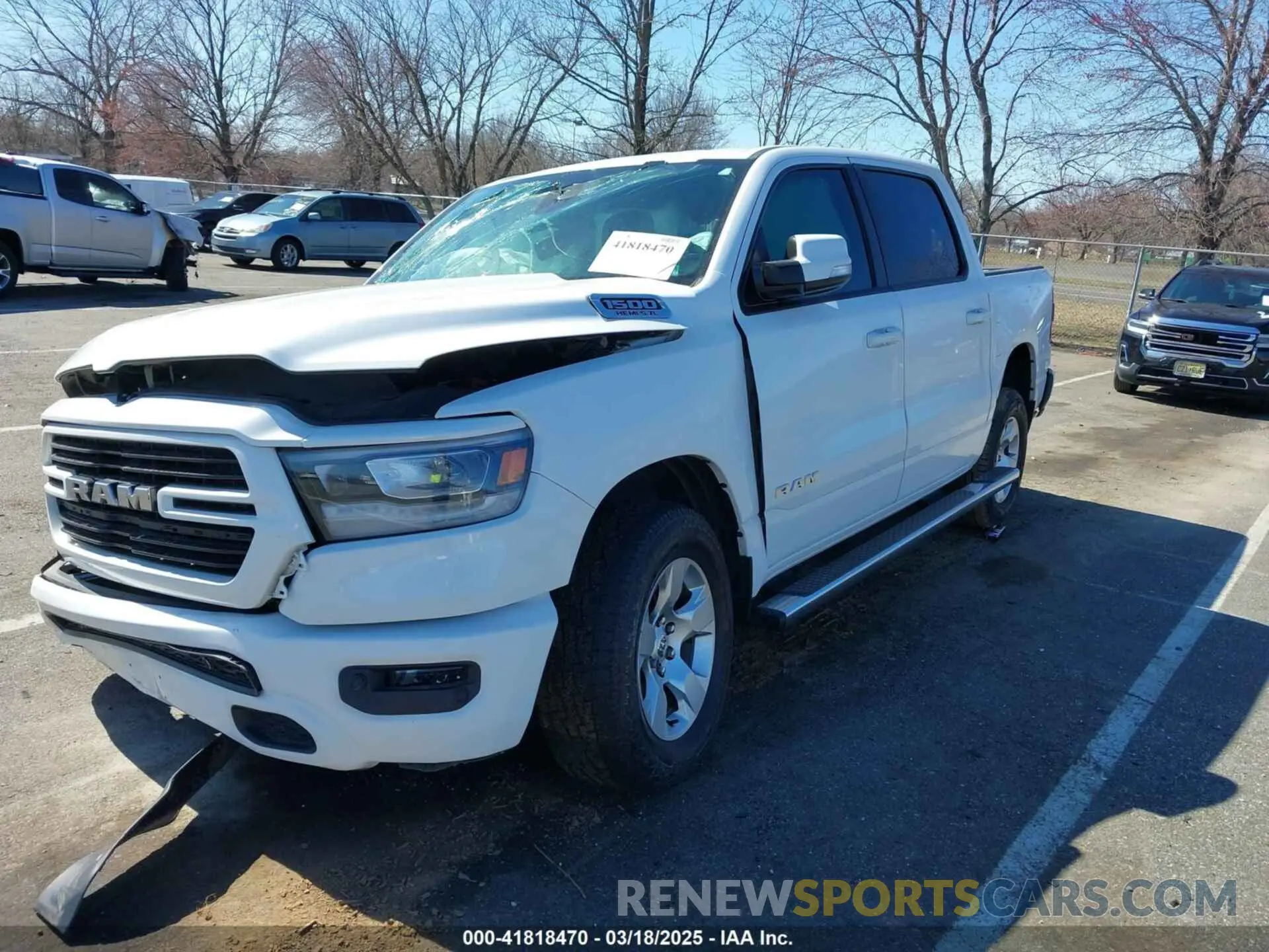 2 Photograph of a damaged car 1C6SRFFT1KN585106 RAM 1500 2019