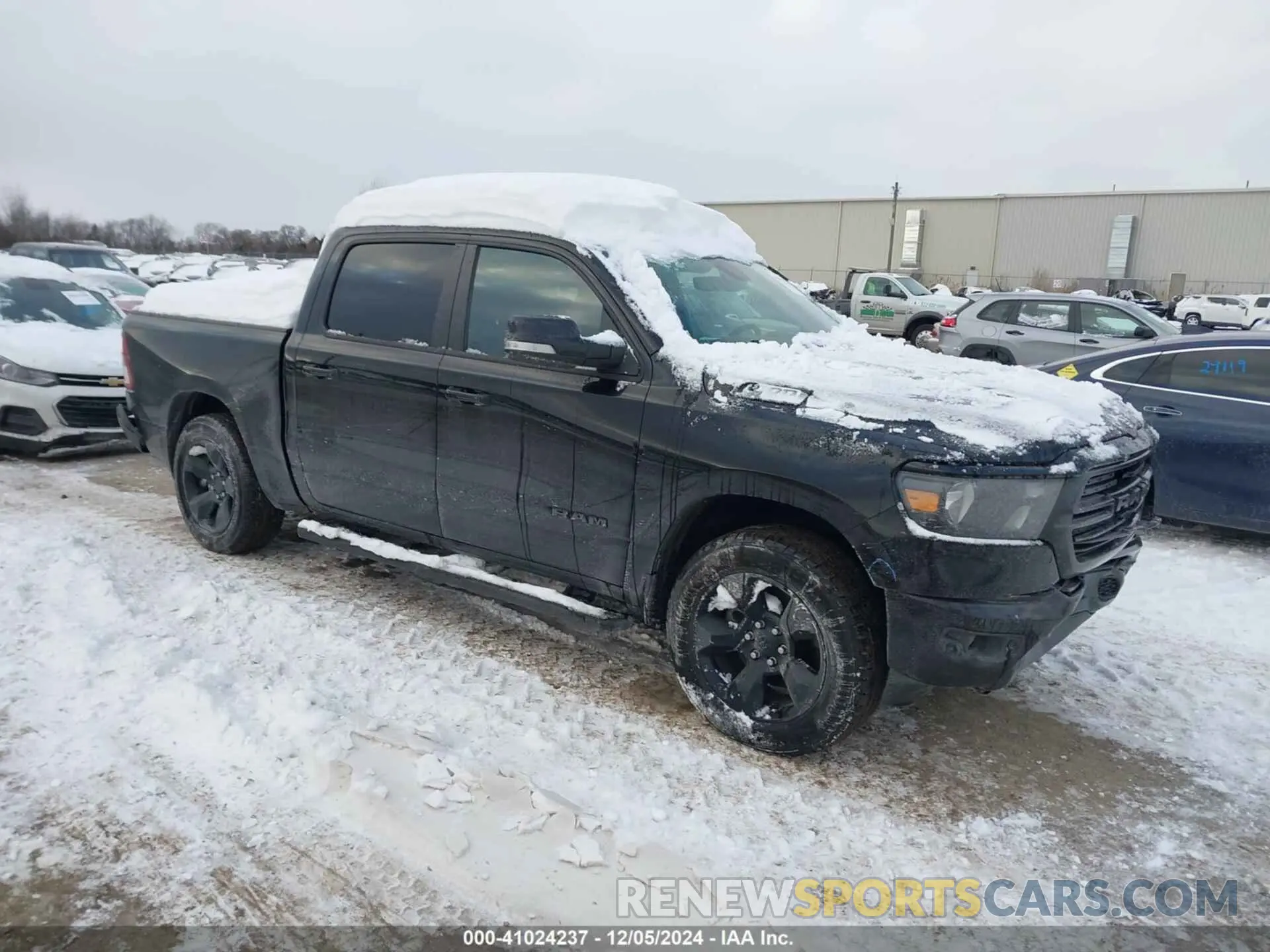 1 Photograph of a damaged car 1C6SRFFT1KN912586 RAM 1500 2019