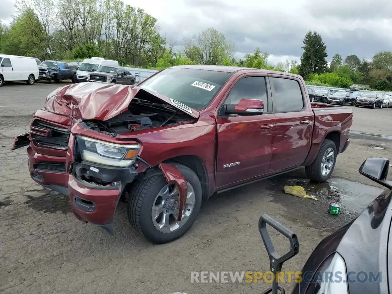 1 Photograph of a damaged car 1C6SRFFT2KN626164 RAM 1500 2019