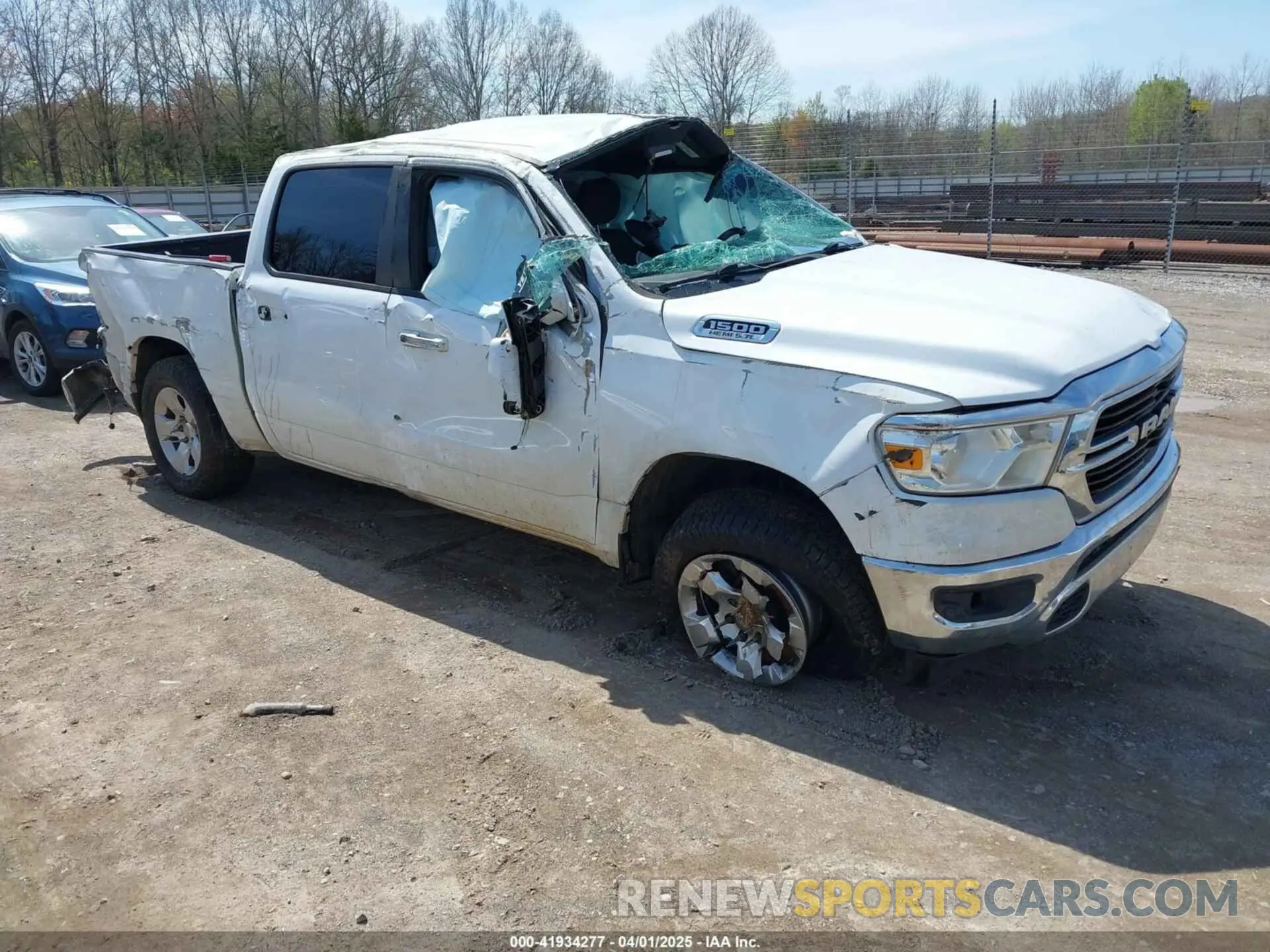 1 Photograph of a damaged car 1C6SRFFT2KN667846 RAM 1500 2019