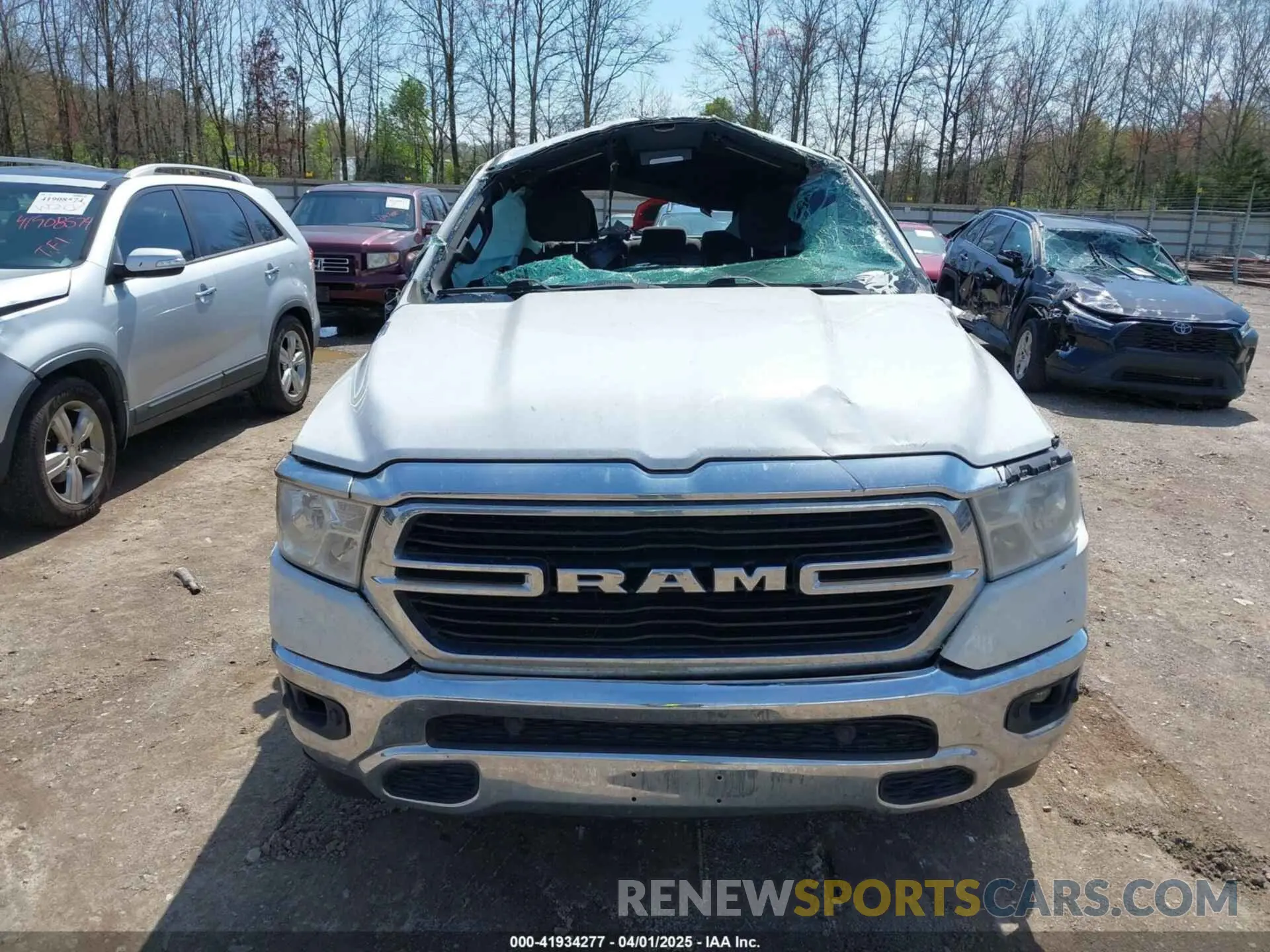 12 Photograph of a damaged car 1C6SRFFT2KN667846 RAM 1500 2019