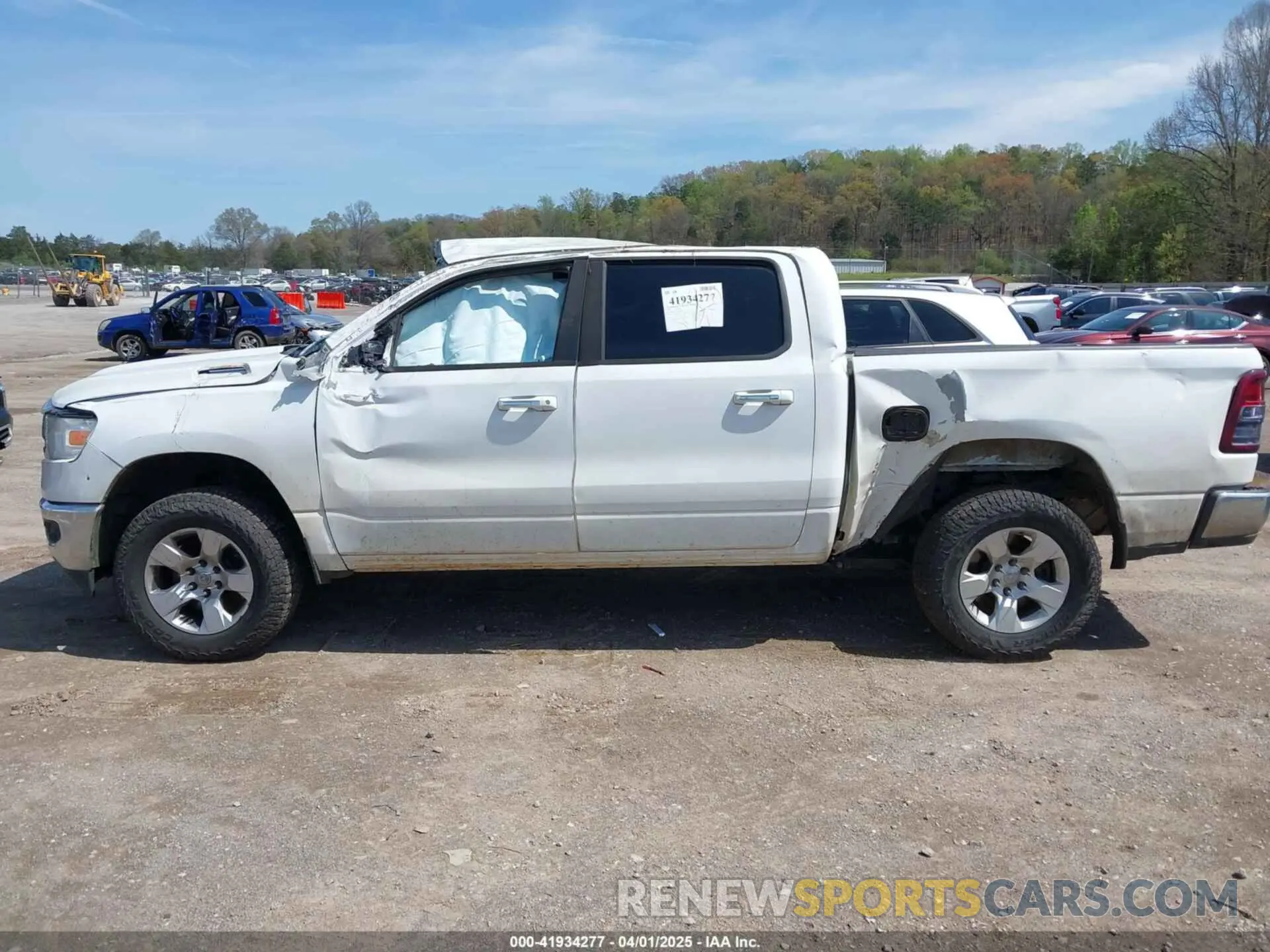 14 Photograph of a damaged car 1C6SRFFT2KN667846 RAM 1500 2019