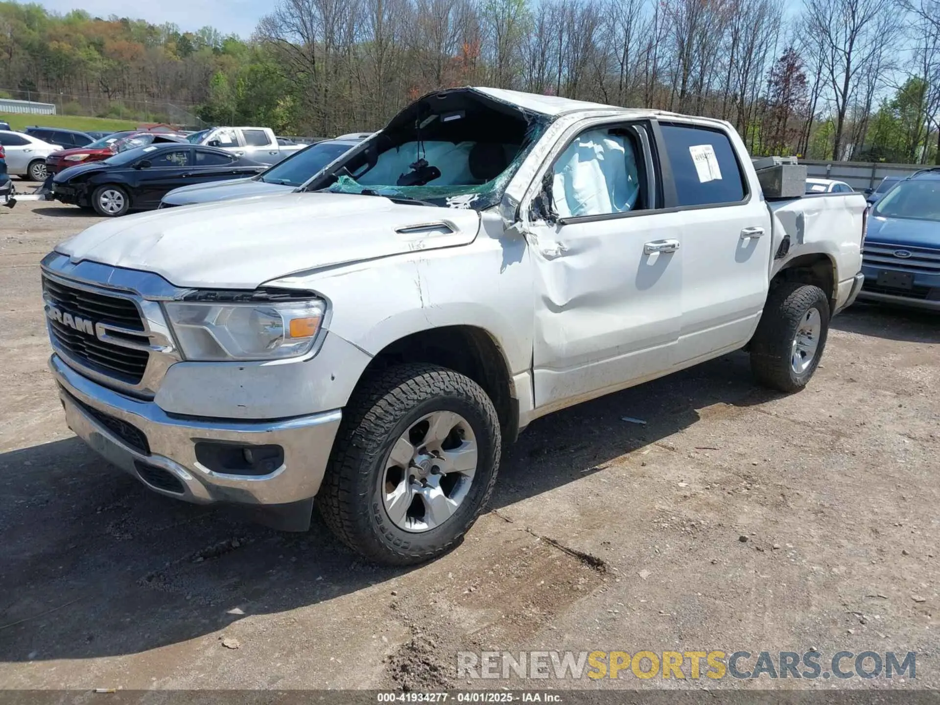 2 Photograph of a damaged car 1C6SRFFT2KN667846 RAM 1500 2019