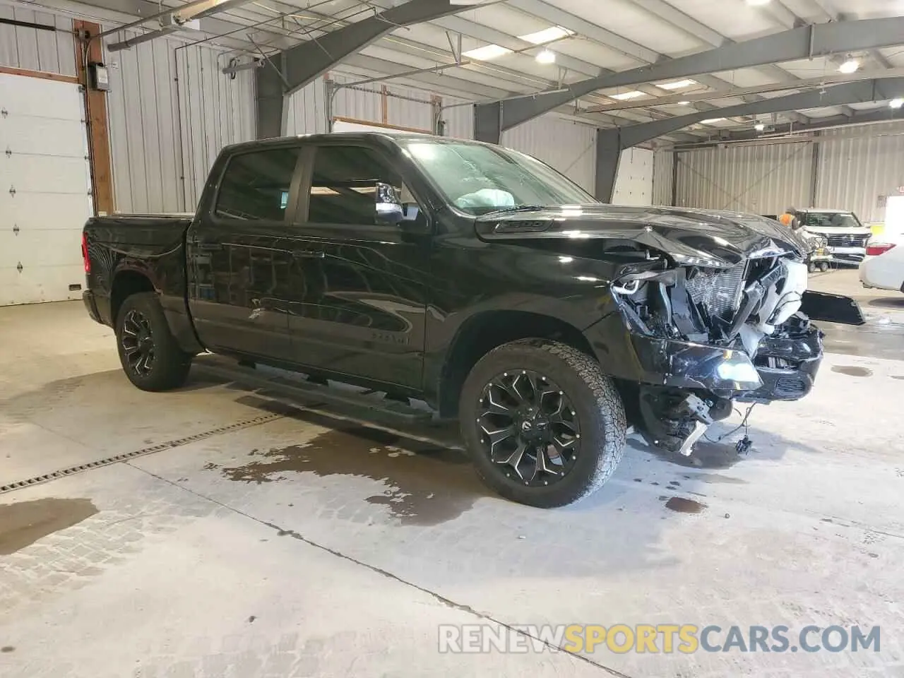 4 Photograph of a damaged car 1C6SRFFT2KN815574 RAM 1500 2019