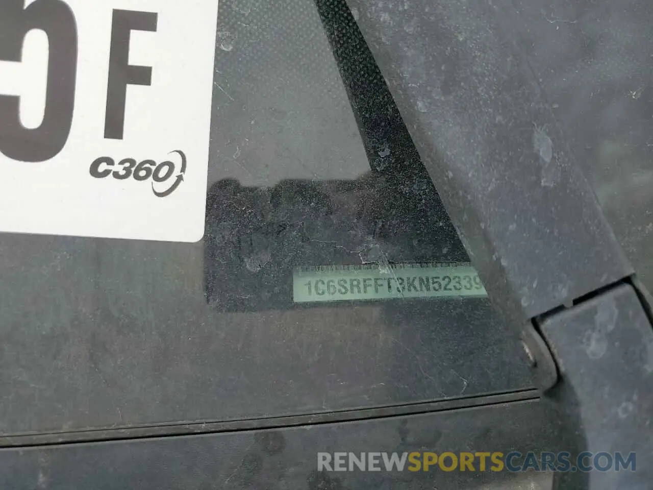 13 Photograph of a damaged car 1C6SRFFT3KN523397 RAM 1500 2019