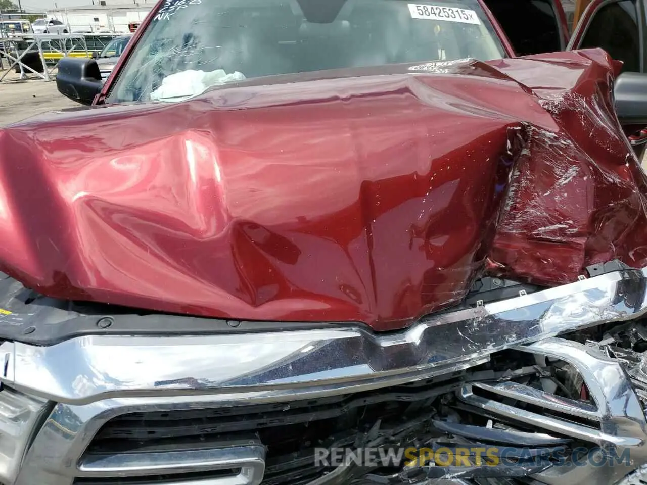 12 Photograph of a damaged car 1C6SRFFT3KN720019 RAM 1500 2019