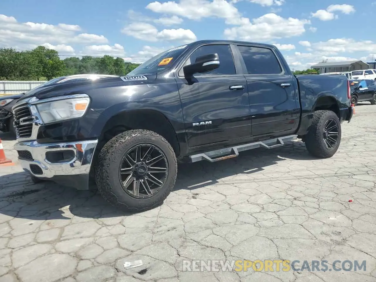 1 Photograph of a damaged car 1C6SRFFT4KN553413 RAM 1500 2019