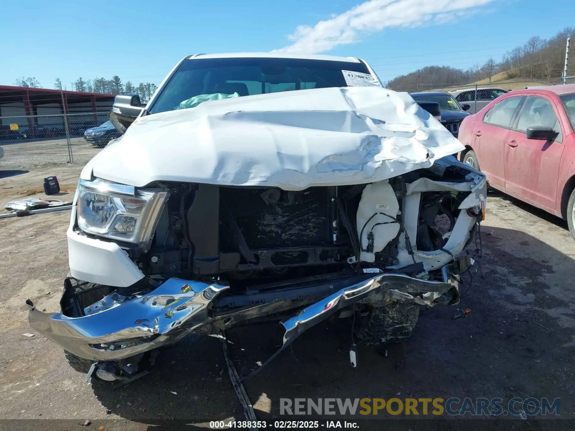 13 Photograph of a damaged car 1C6SRFFT4KN555761 RAM 1500 2019