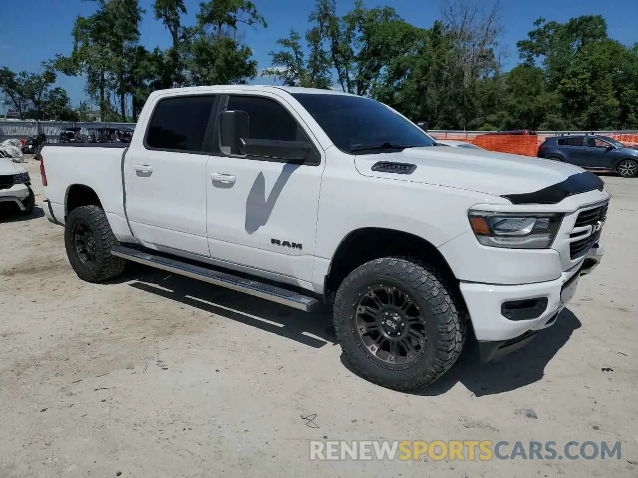 4 Photograph of a damaged car 1C6SRFFT4KN598755 RAM 1500 2019