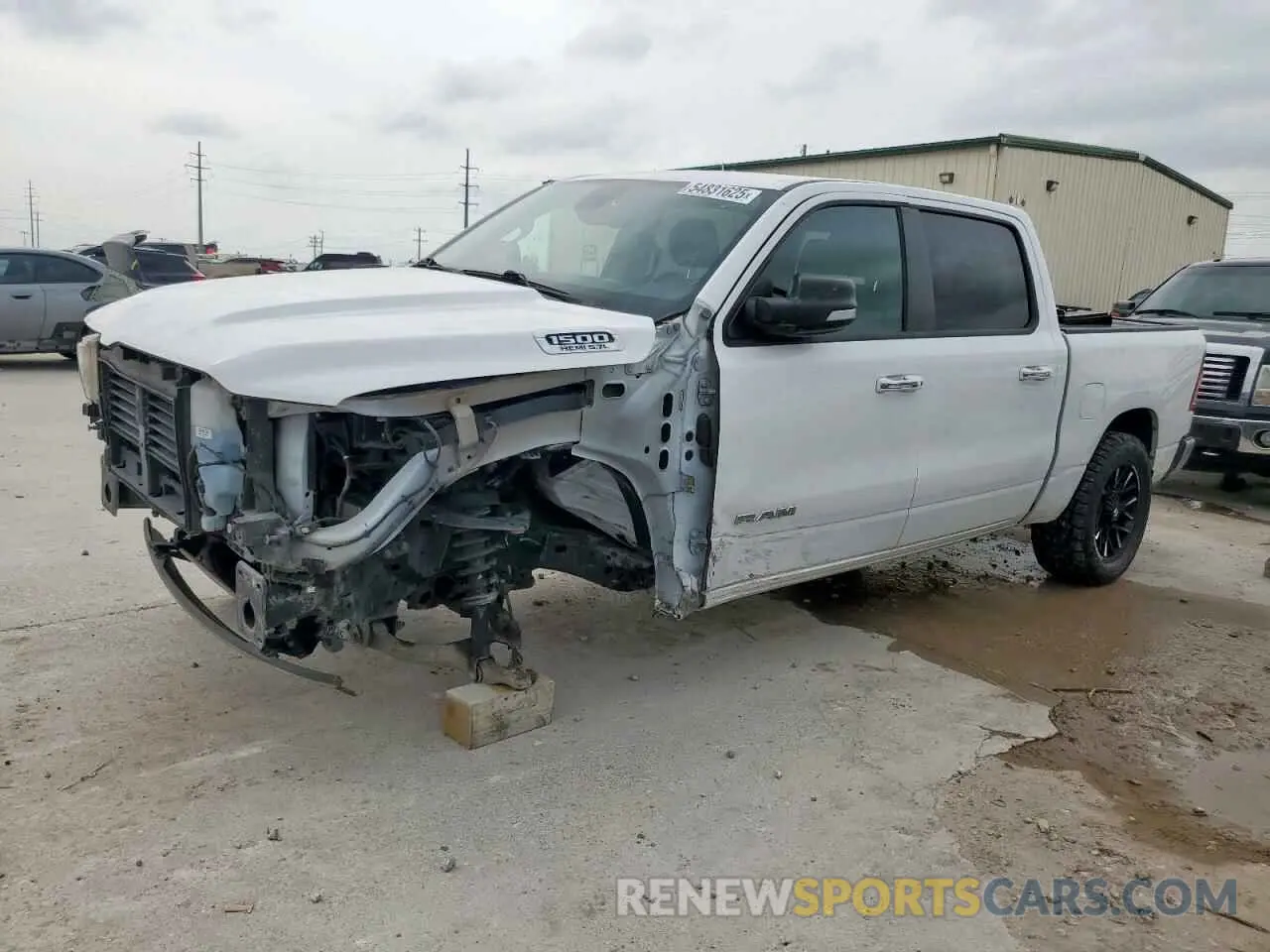 1 Photograph of a damaged car 1C6SRFFT5KN570365 RAM 1500 2019