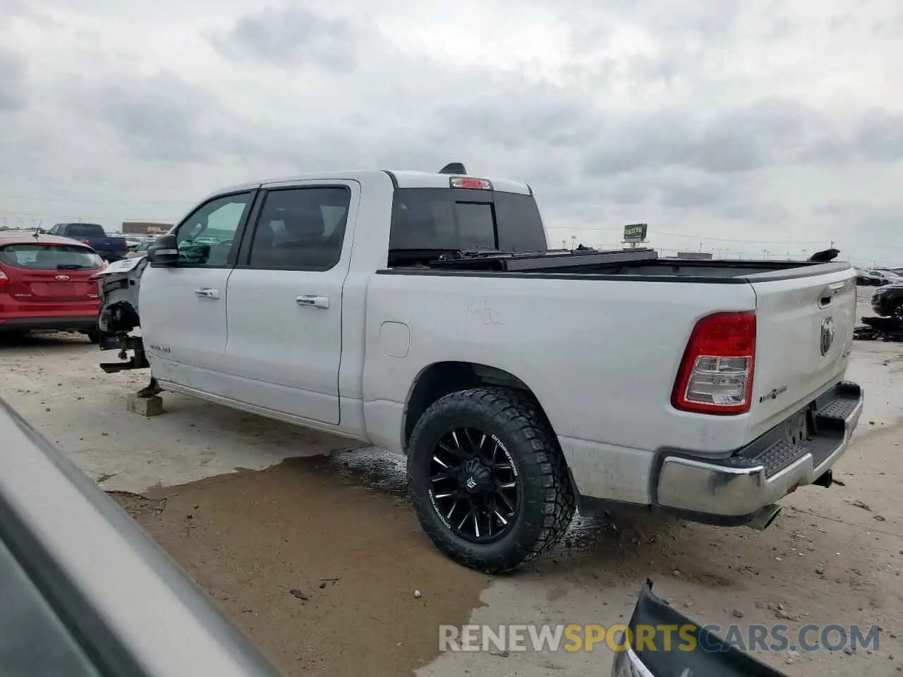 2 Photograph of a damaged car 1C6SRFFT5KN570365 RAM 1500 2019