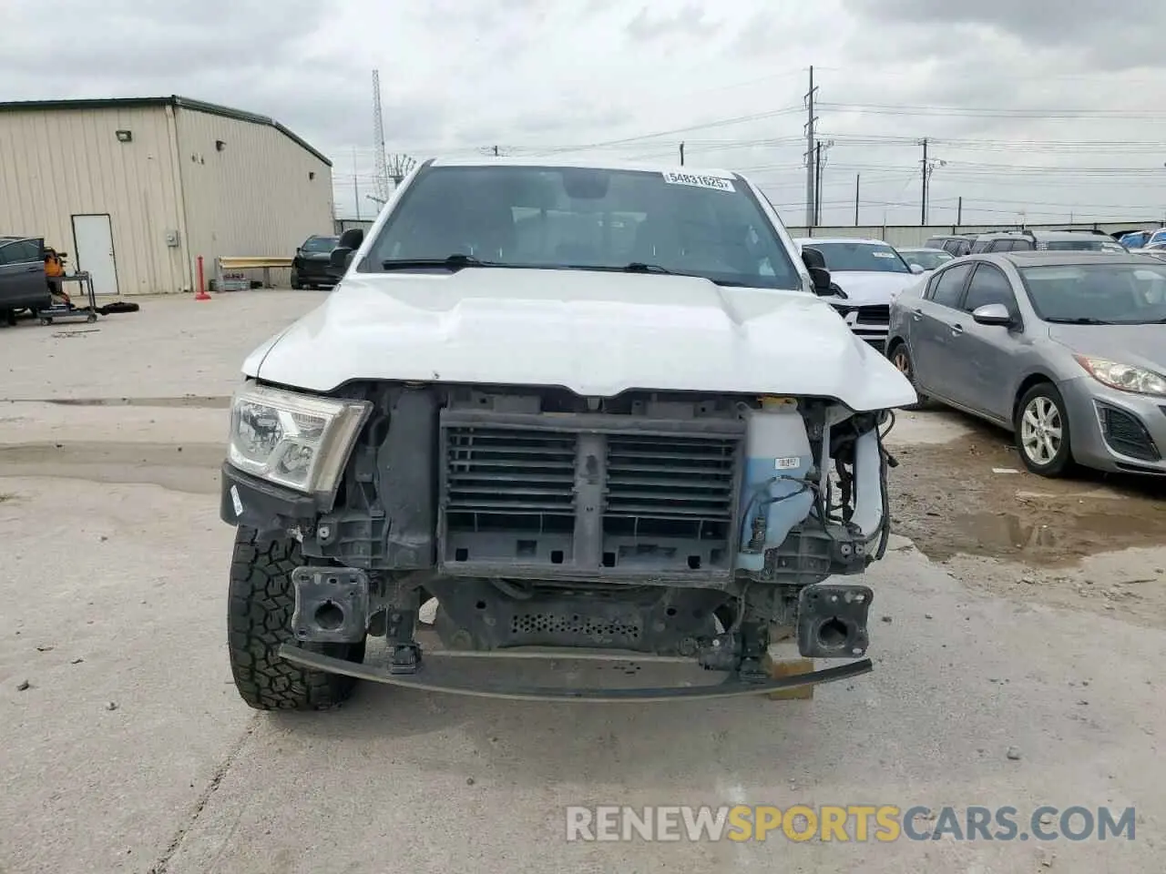 5 Photograph of a damaged car 1C6SRFFT5KN570365 RAM 1500 2019