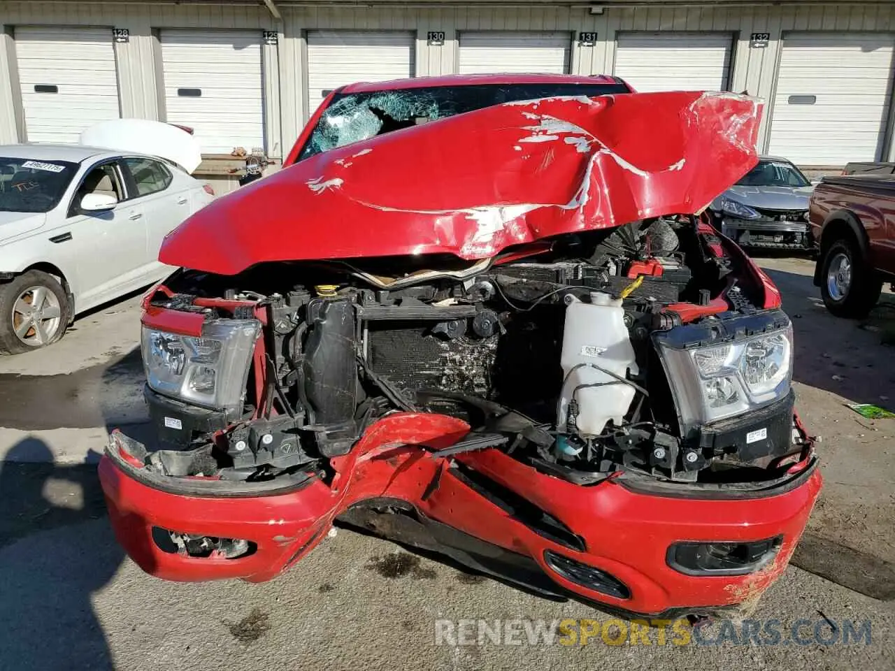 5 Photograph of a damaged car 1C6SRFFT5KN614090 RAM 1500 2019