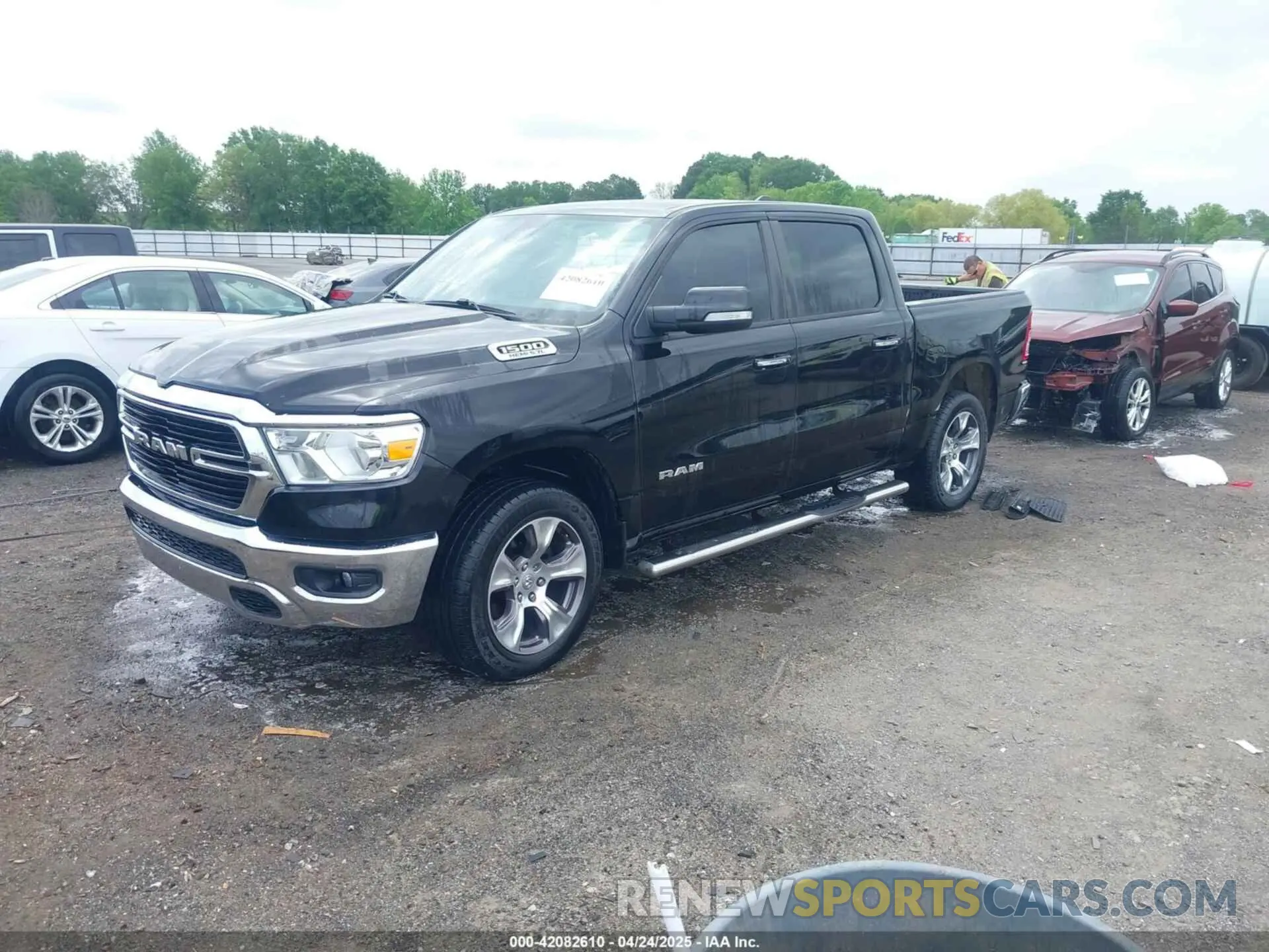 2 Photograph of a damaged car 1C6SRFFT5KN649664 RAM 1500 2019