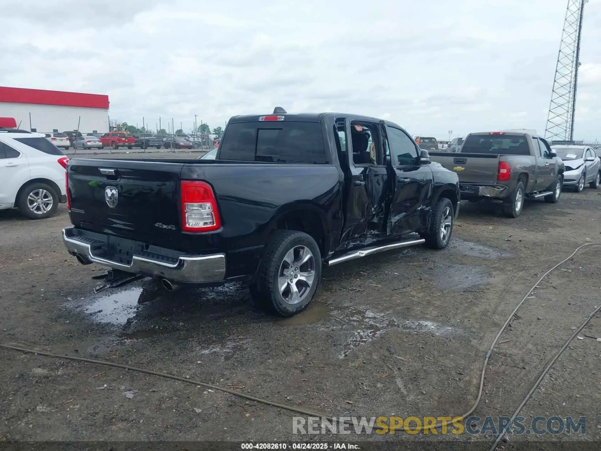 4 Photograph of a damaged car 1C6SRFFT5KN649664 RAM 1500 2019