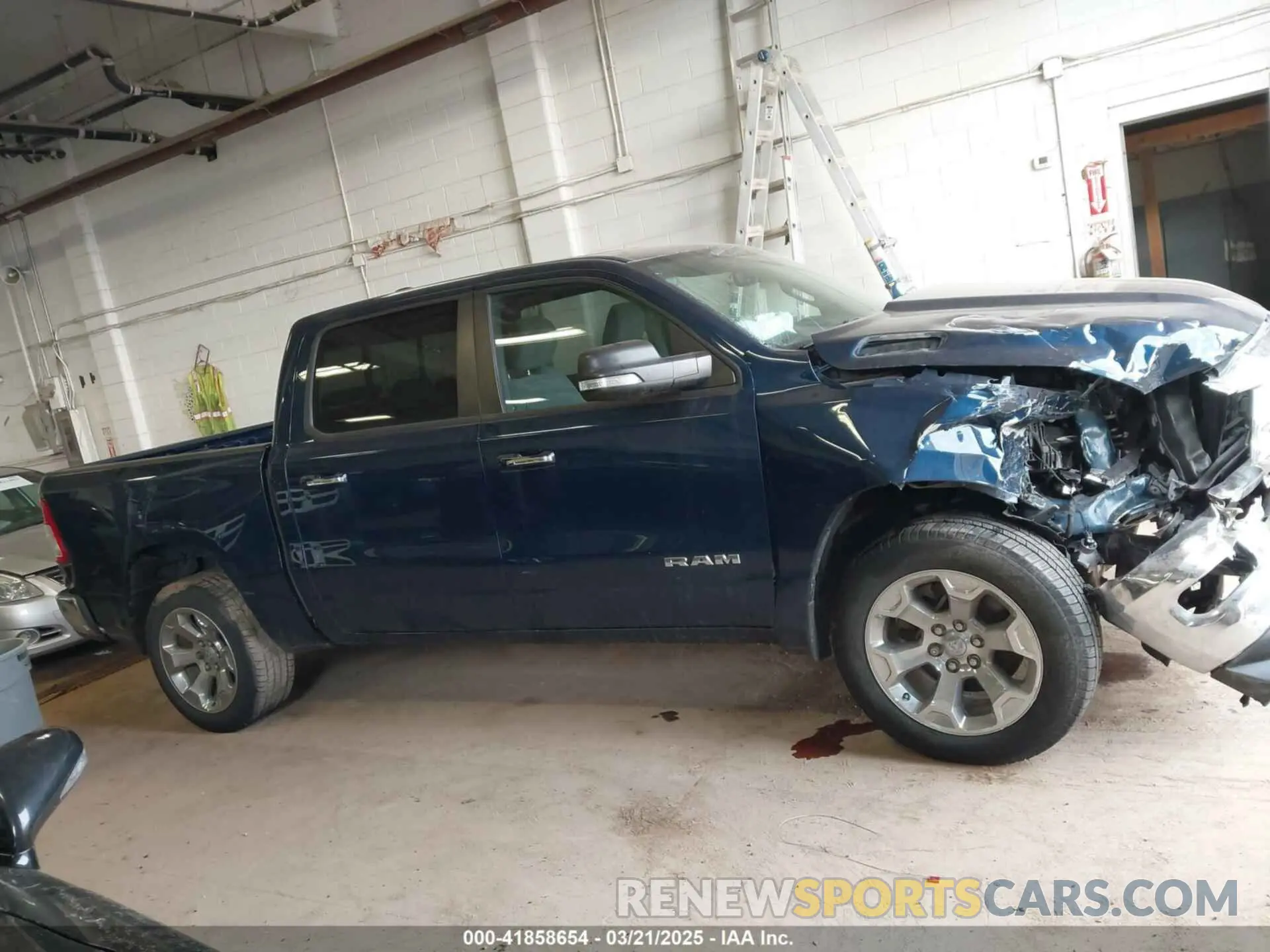 13 Photograph of a damaged car 1C6SRFFT5KN762580 RAM 1500 2019