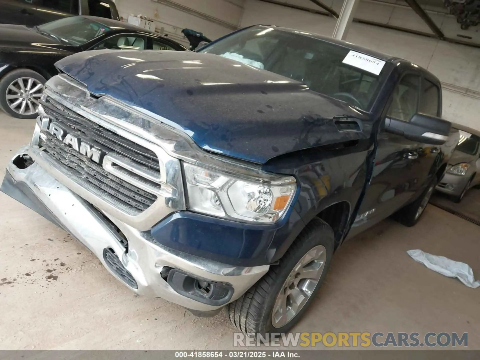 2 Photograph of a damaged car 1C6SRFFT5KN762580 RAM 1500 2019