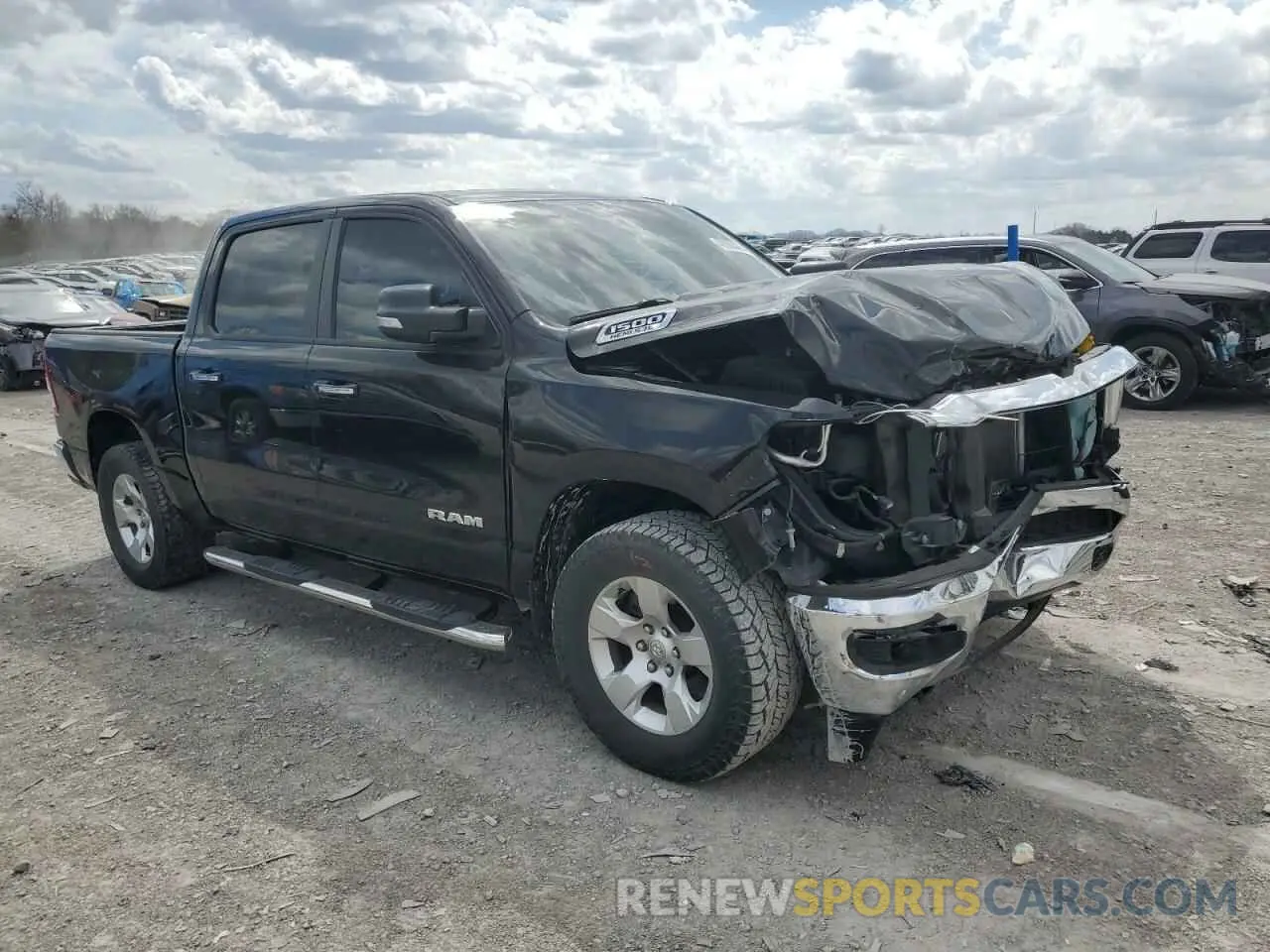 4 Photograph of a damaged car 1C6SRFFT5KN823779 RAM 1500 2019