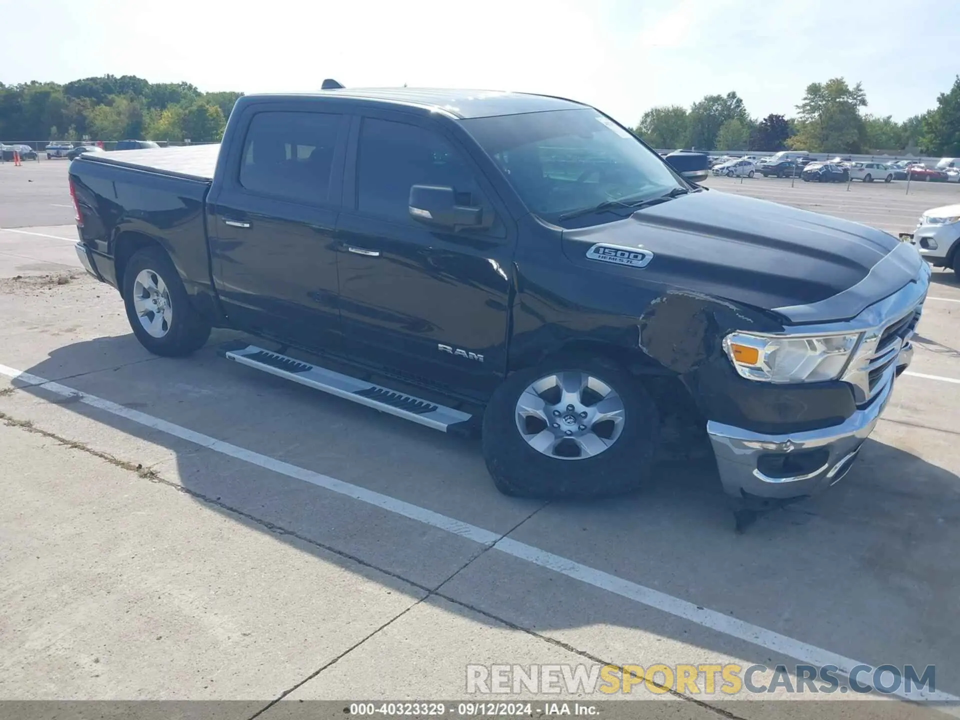 1 Photograph of a damaged car 1C6SRFFT6KN571315 RAM 1500 2019