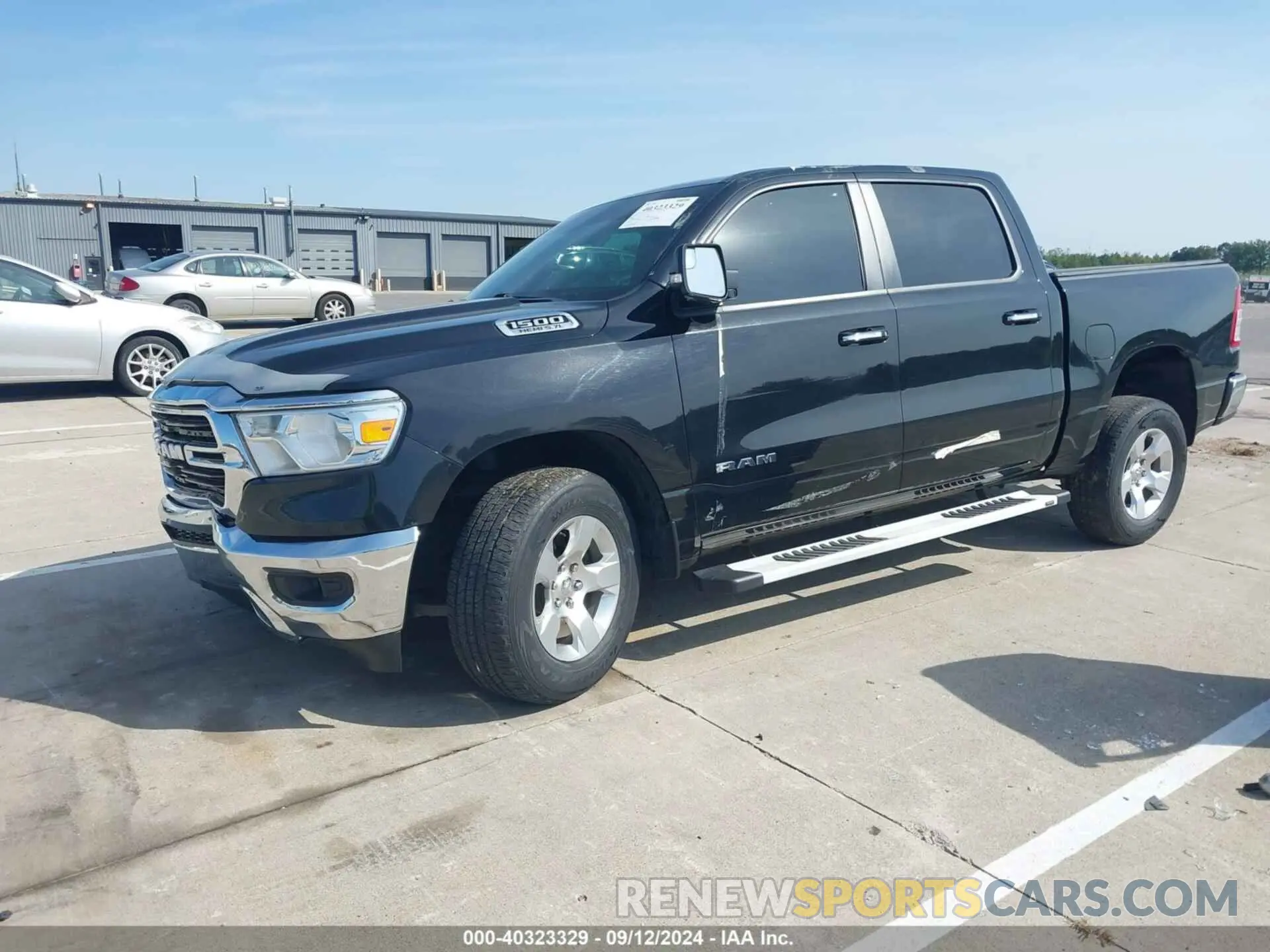 2 Photograph of a damaged car 1C6SRFFT6KN571315 RAM 1500 2019
