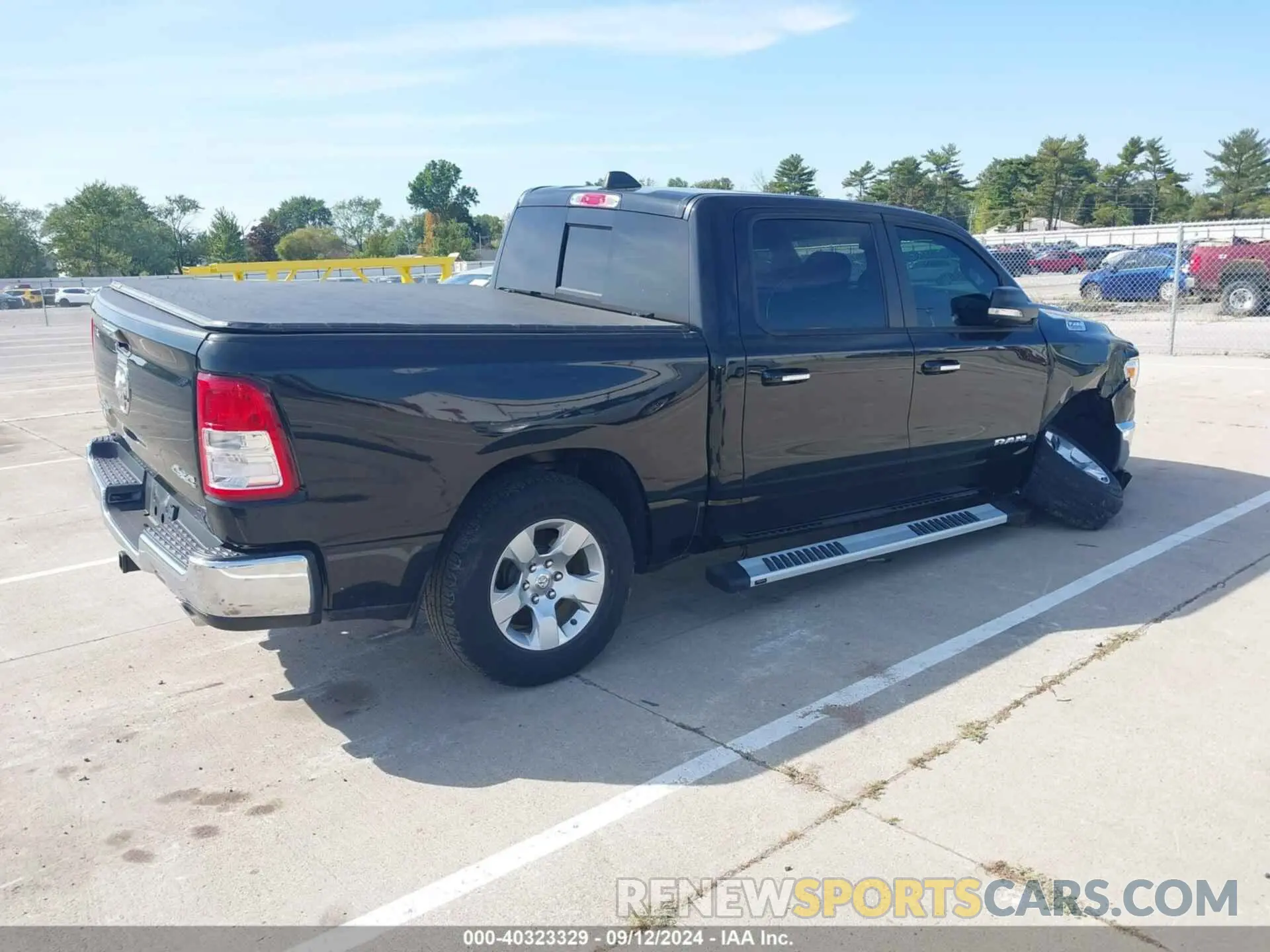 4 Photograph of a damaged car 1C6SRFFT6KN571315 RAM 1500 2019