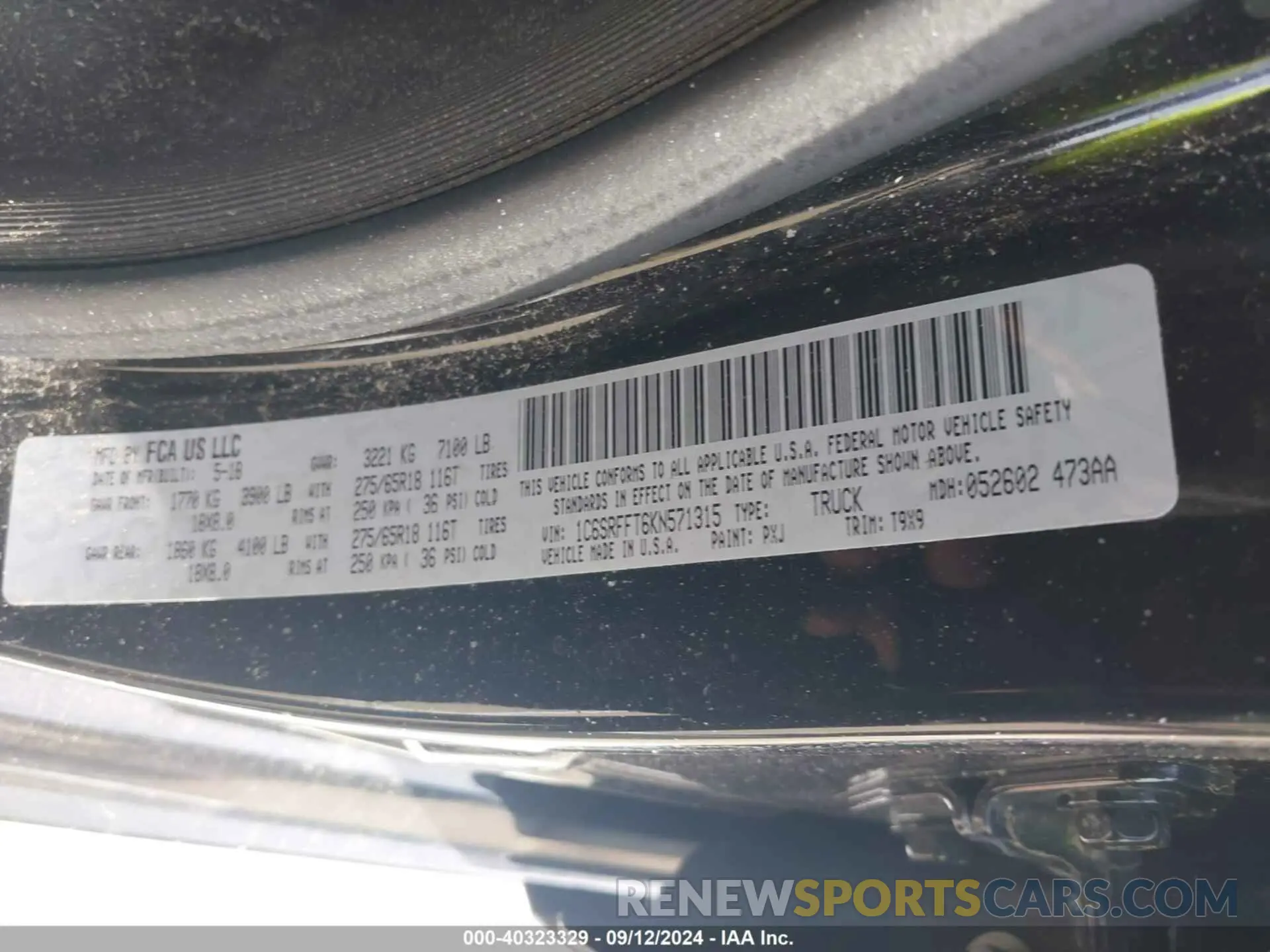 9 Photograph of a damaged car 1C6SRFFT6KN571315 RAM 1500 2019