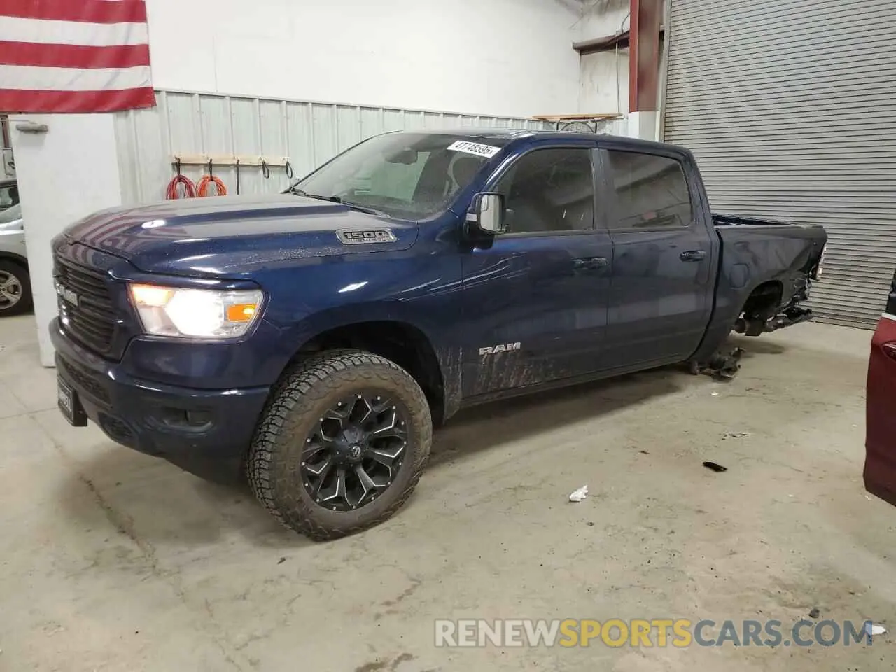 1 Photograph of a damaged car 1C6SRFFT6KN622358 RAM 1500 2019