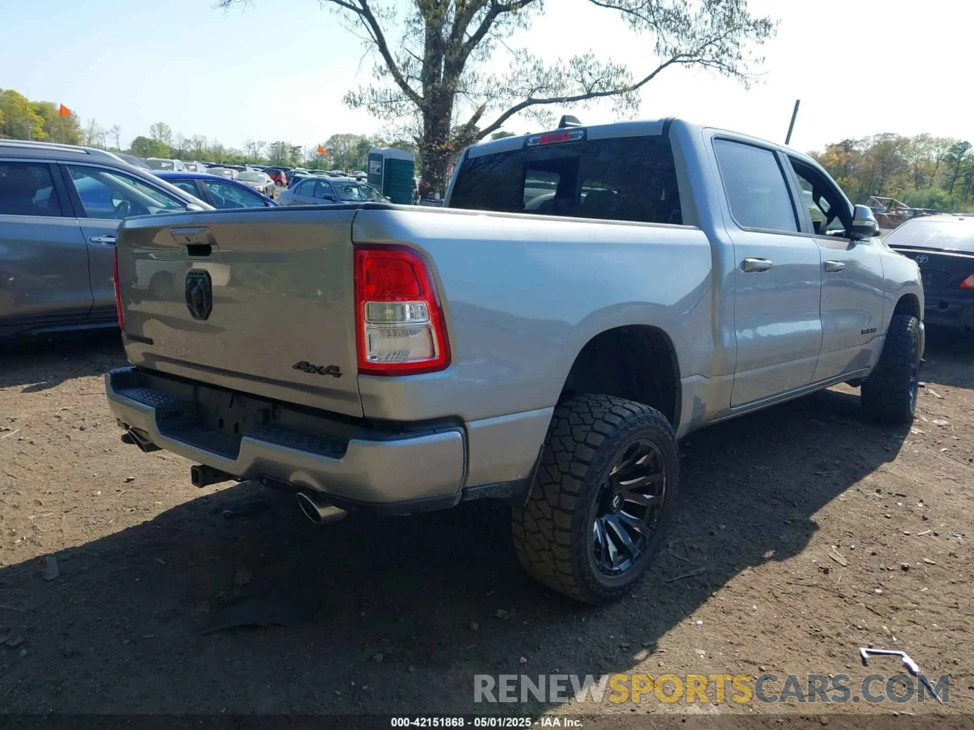 4 Photograph of a damaged car 1C6SRFFT6KN733556 RAM 1500 2019