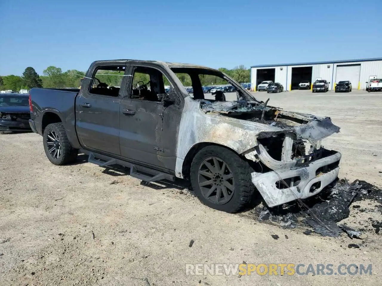 4 Photograph of a damaged car 1C6SRFFT6KN784684 RAM 1500 2019
