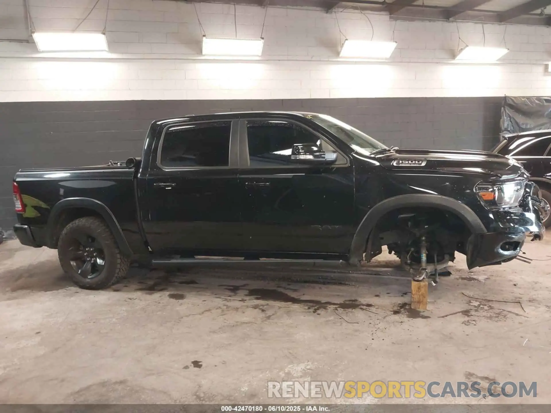 14 Photograph of a damaged car 1C6SRFFT6KN890780 RAM 1500 2019