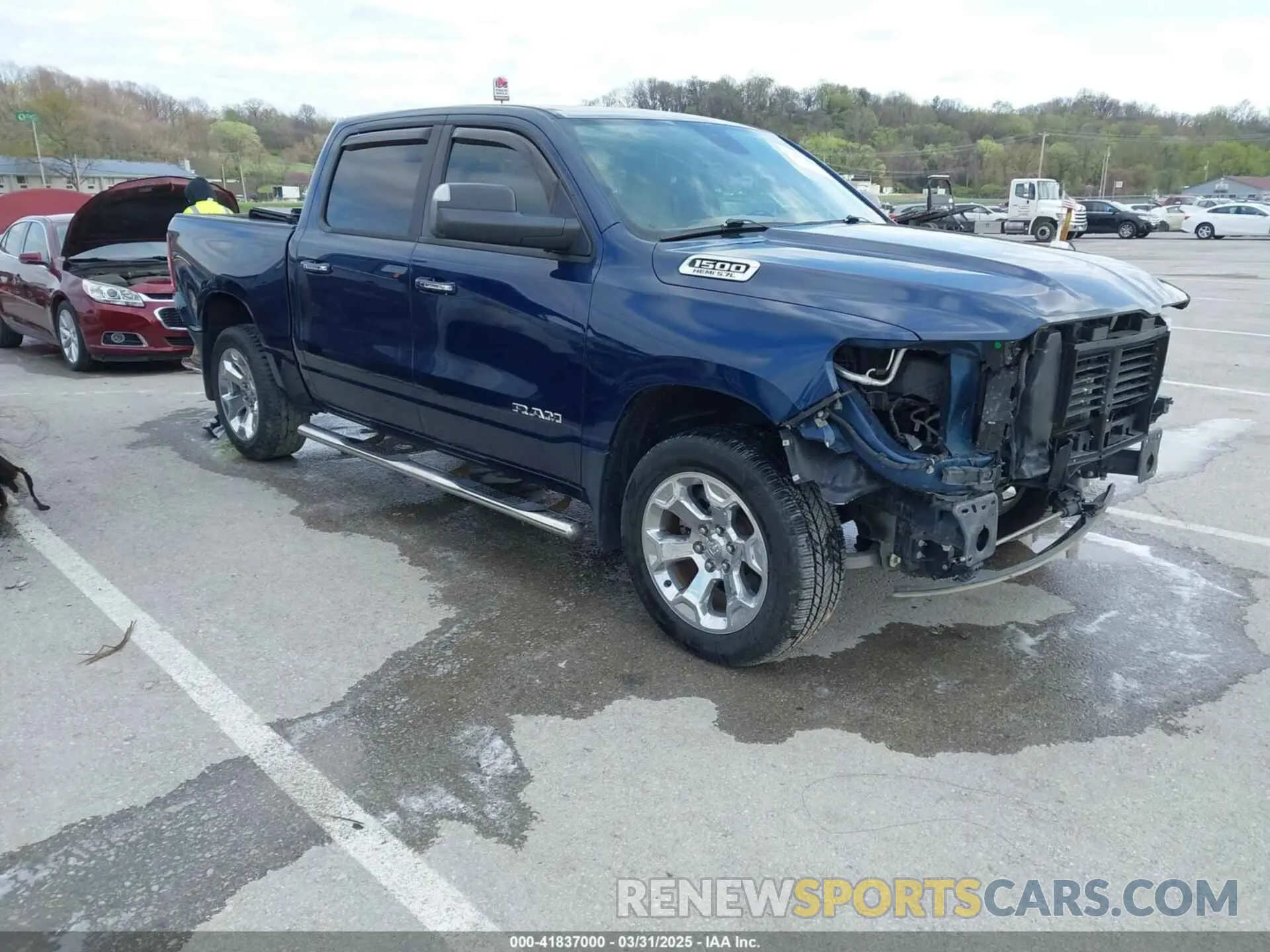 1 Photograph of a damaged car 1C6SRFFT7KN804585 RAM 1500 2019