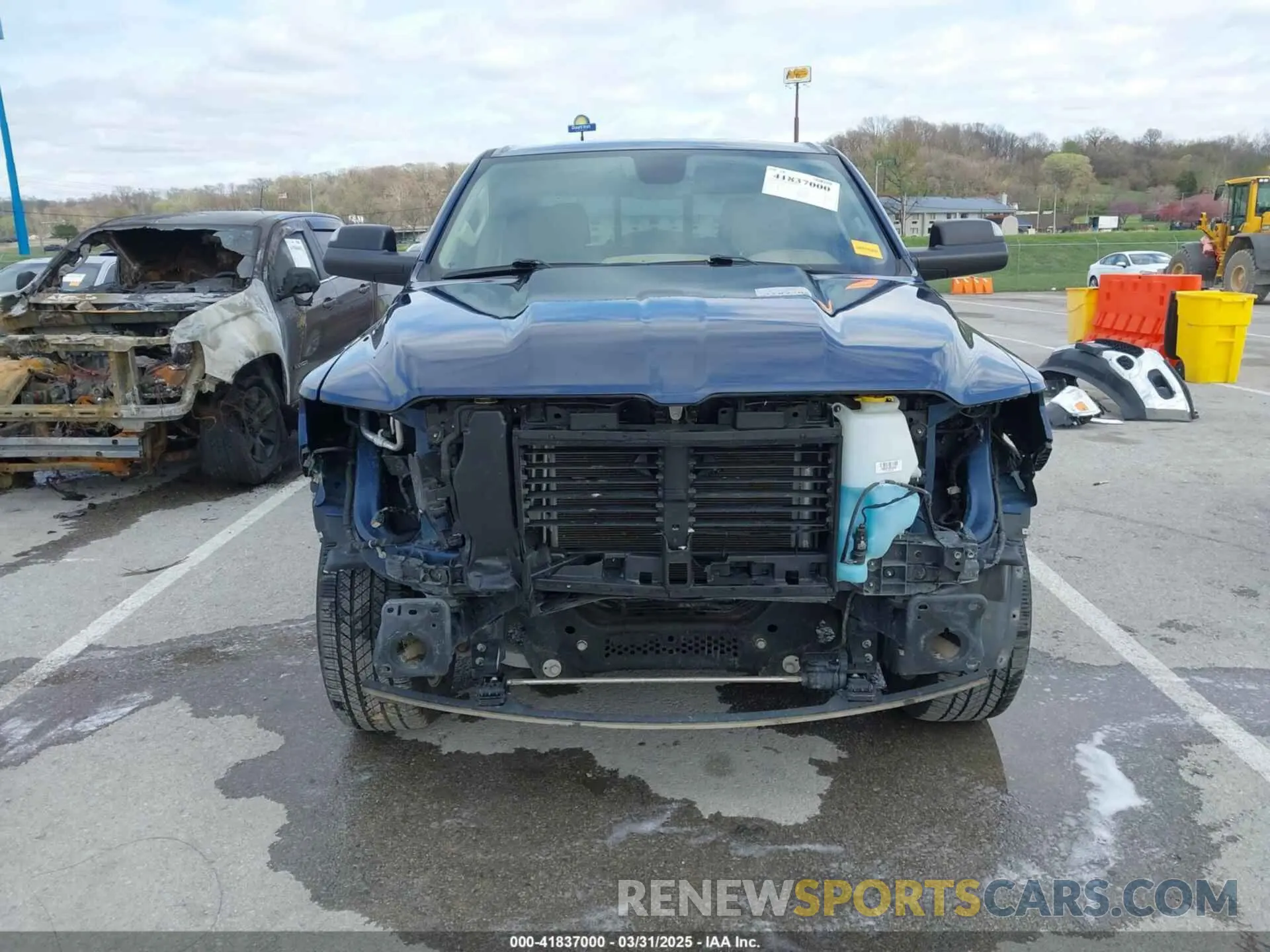13 Photograph of a damaged car 1C6SRFFT7KN804585 RAM 1500 2019