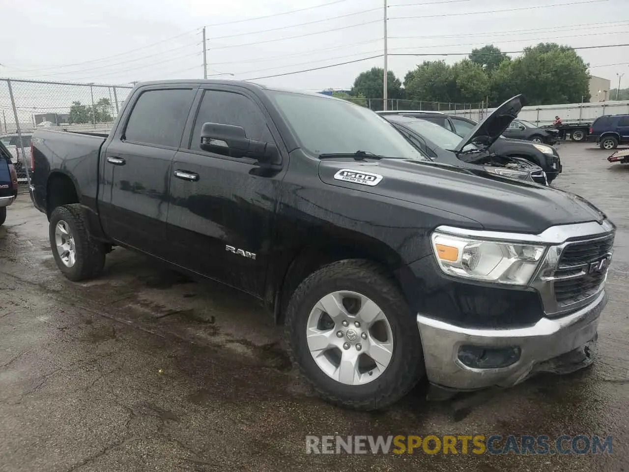 4 Photograph of a damaged car 1C6SRFFT7KN854273 RAM 1500 2019