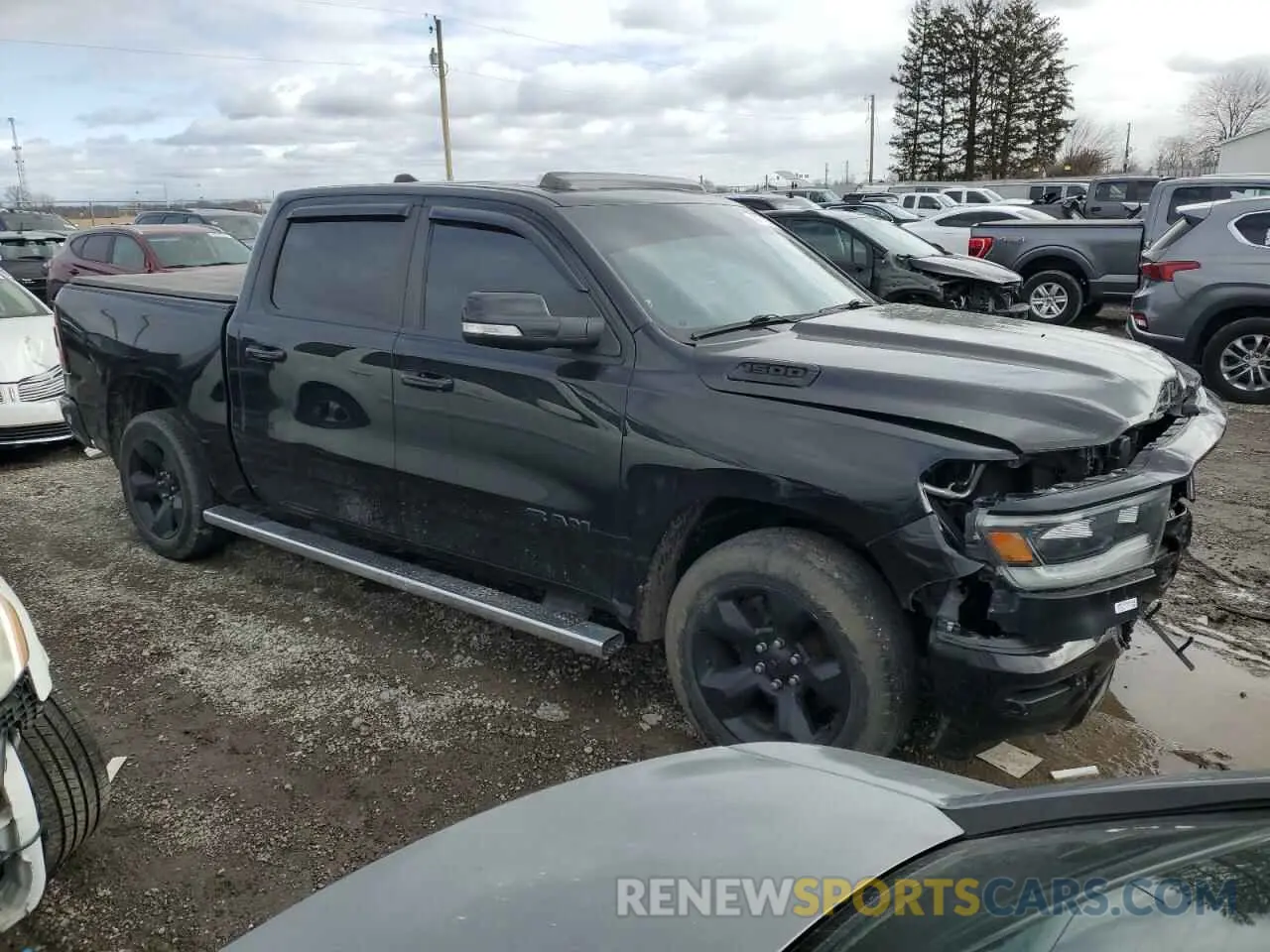 4 Photograph of a damaged car 1C6SRFFT8KN710666 RAM 1500 2019