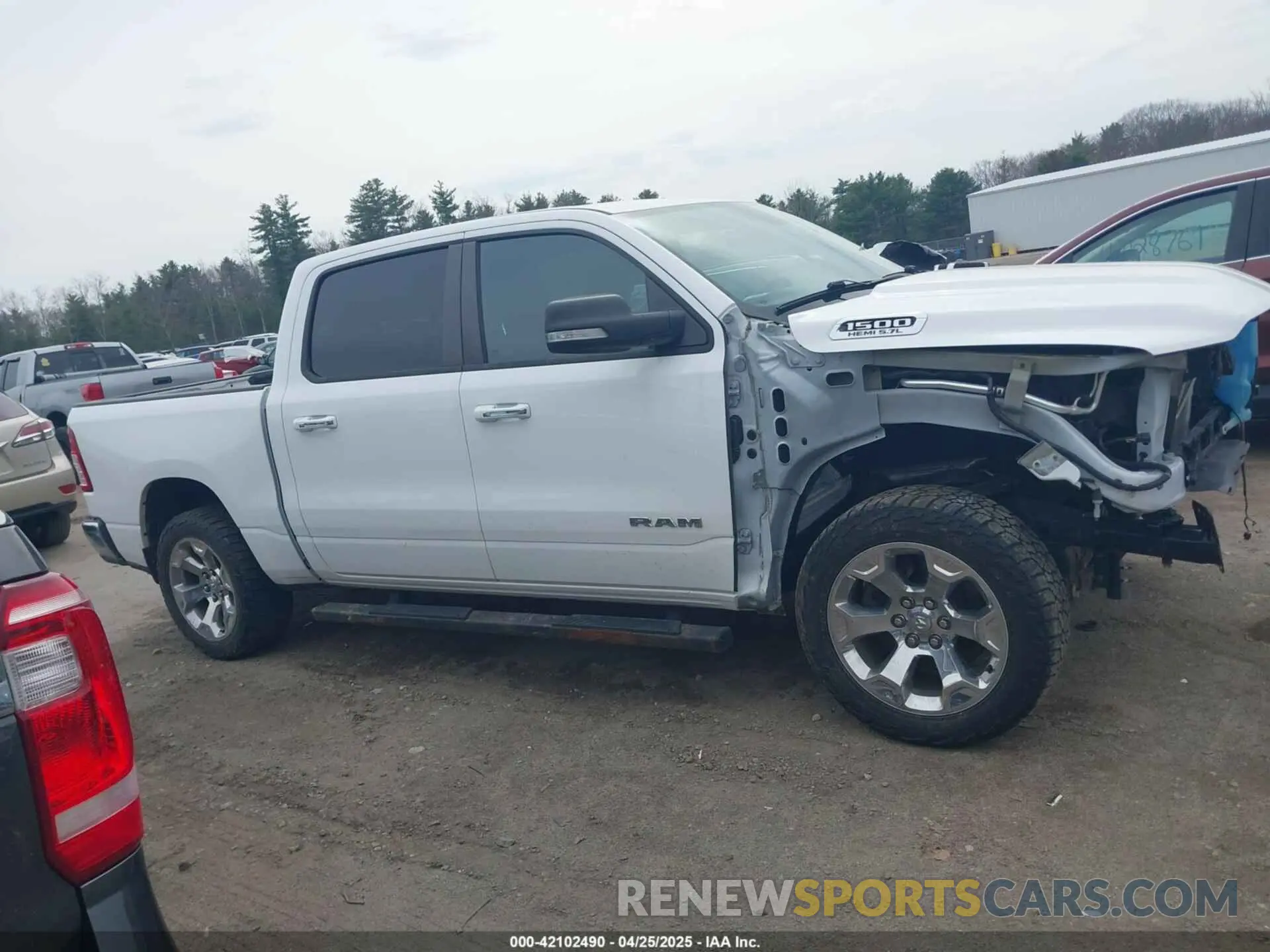 14 Photograph of a damaged car 1C6SRFFT8KN885693 RAM 1500 2019