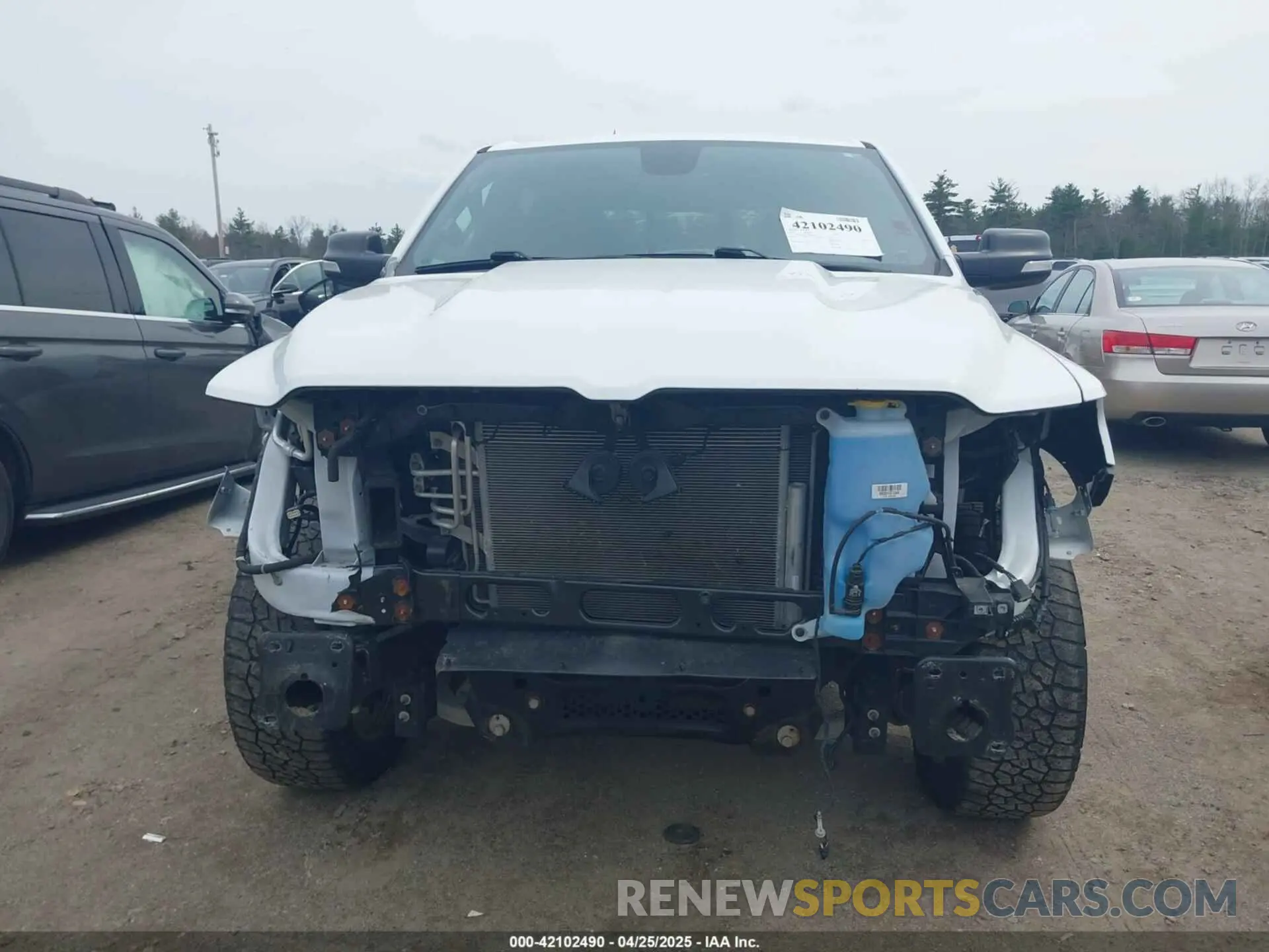 6 Photograph of a damaged car 1C6SRFFT8KN885693 RAM 1500 2019